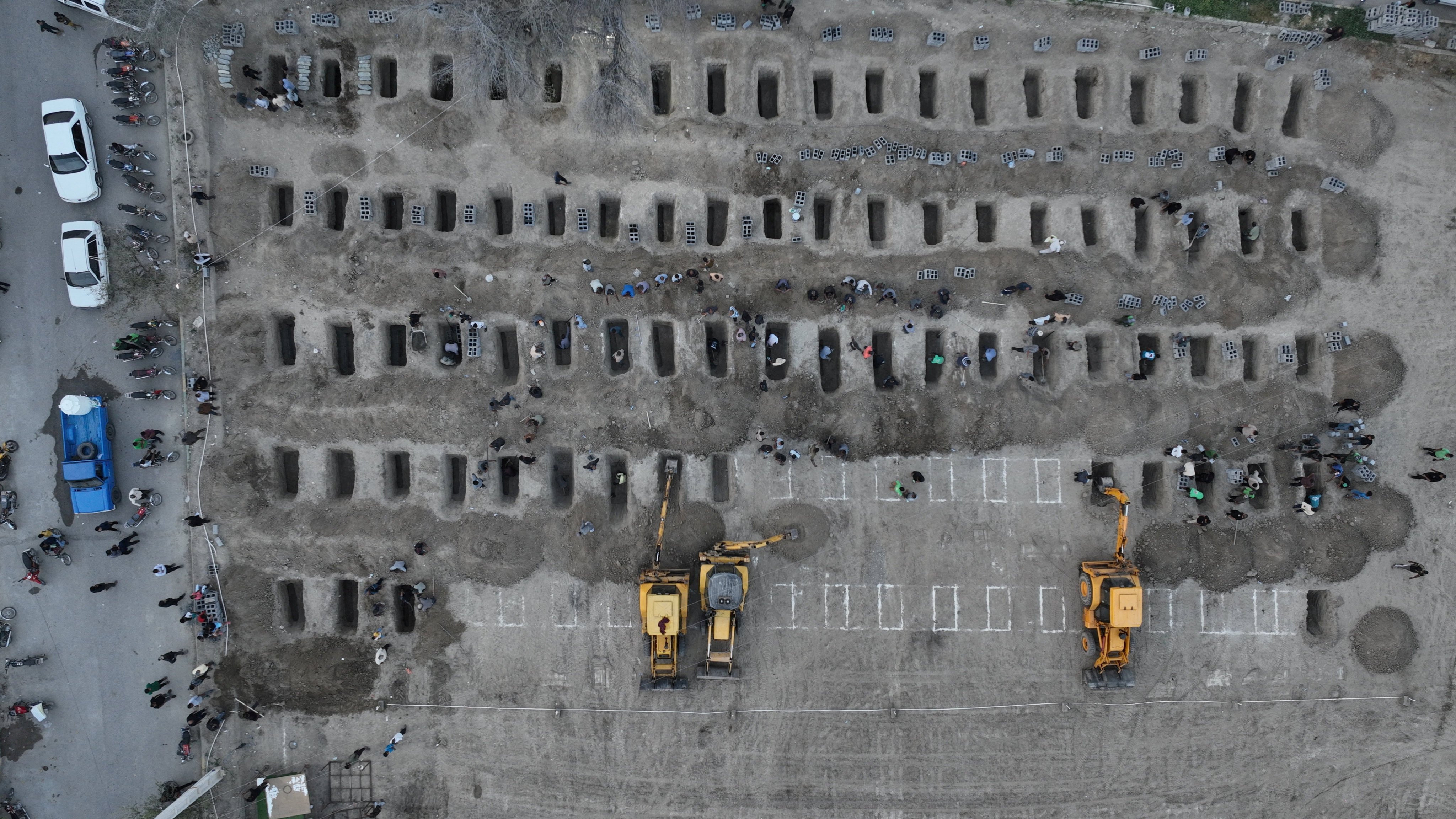Graves for victims of the strike on a school in Minab, Iran. Photo: Iranian Foreign Media Department via Reuters