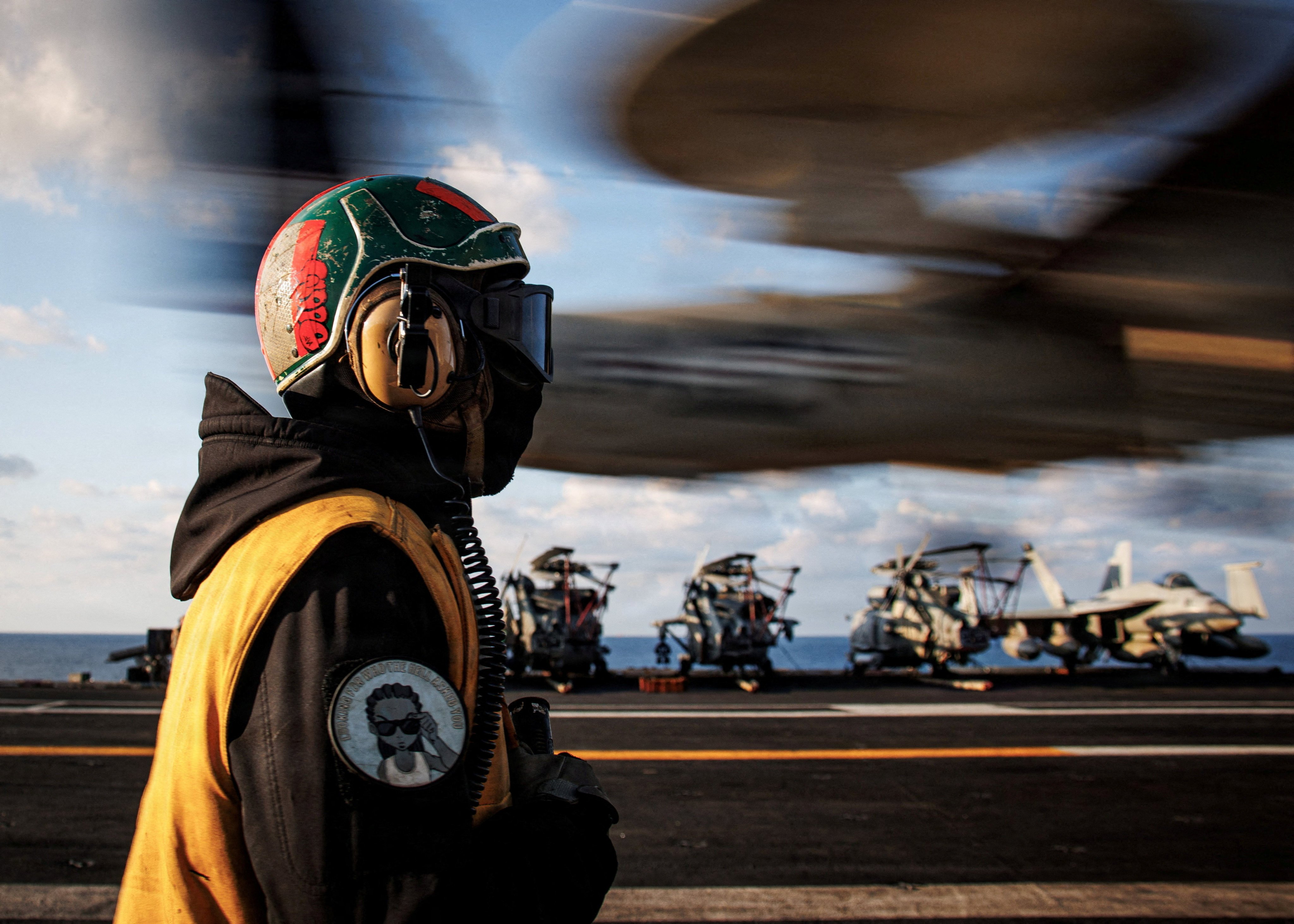 A sailor observes the landing of an E-2D Hawkeye on the aircraft carrier USS Gerald R. Ford while operating in support of the Operation Epic Fury attack on Iran in the eastern Mediterranean Sea, on March 2. Photo: US Navy via Reuters
