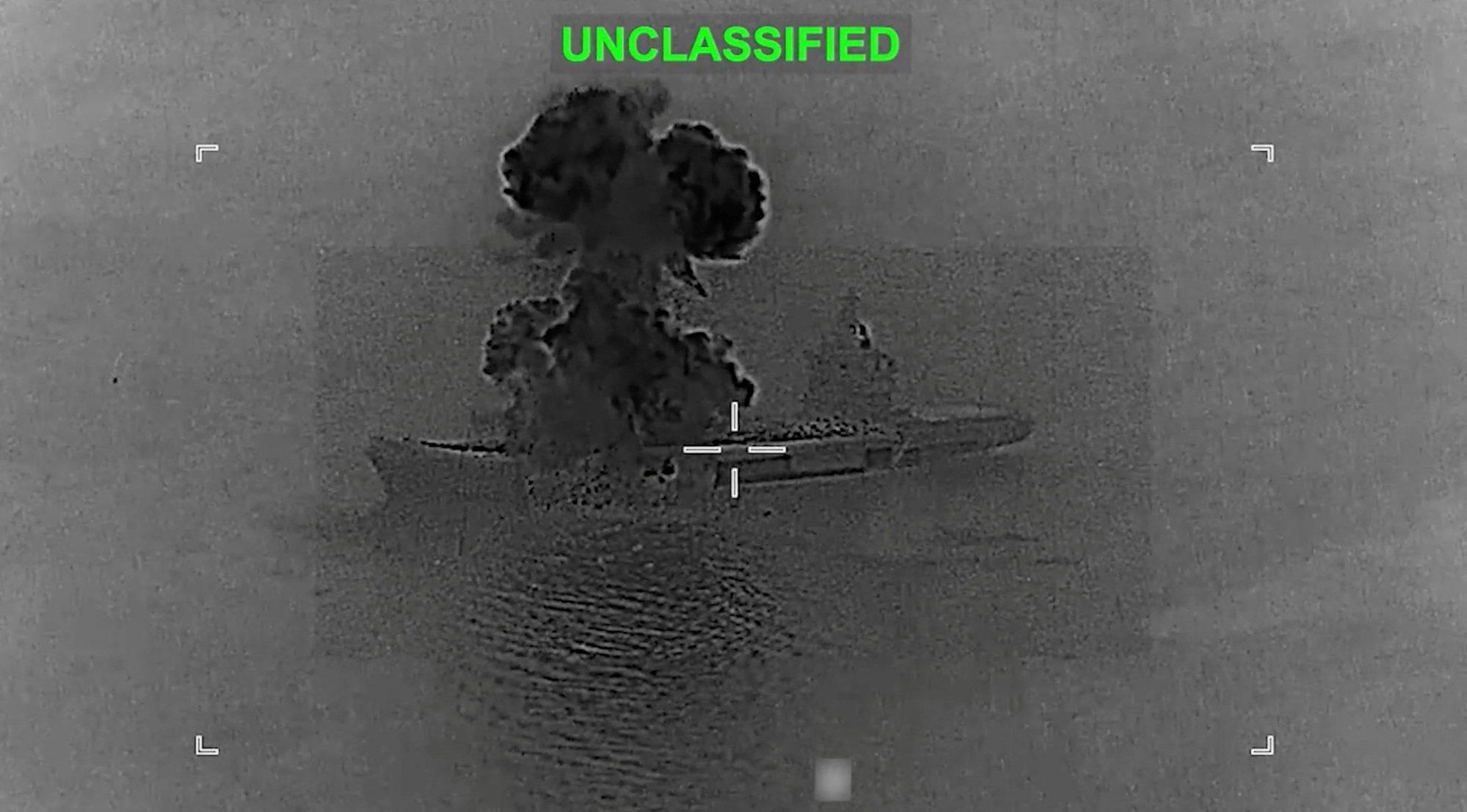 Smoke rises from what the US Central Command says is an Iranian drone carrier that was struck by US forces. Photo: CENTCOM via Reuters