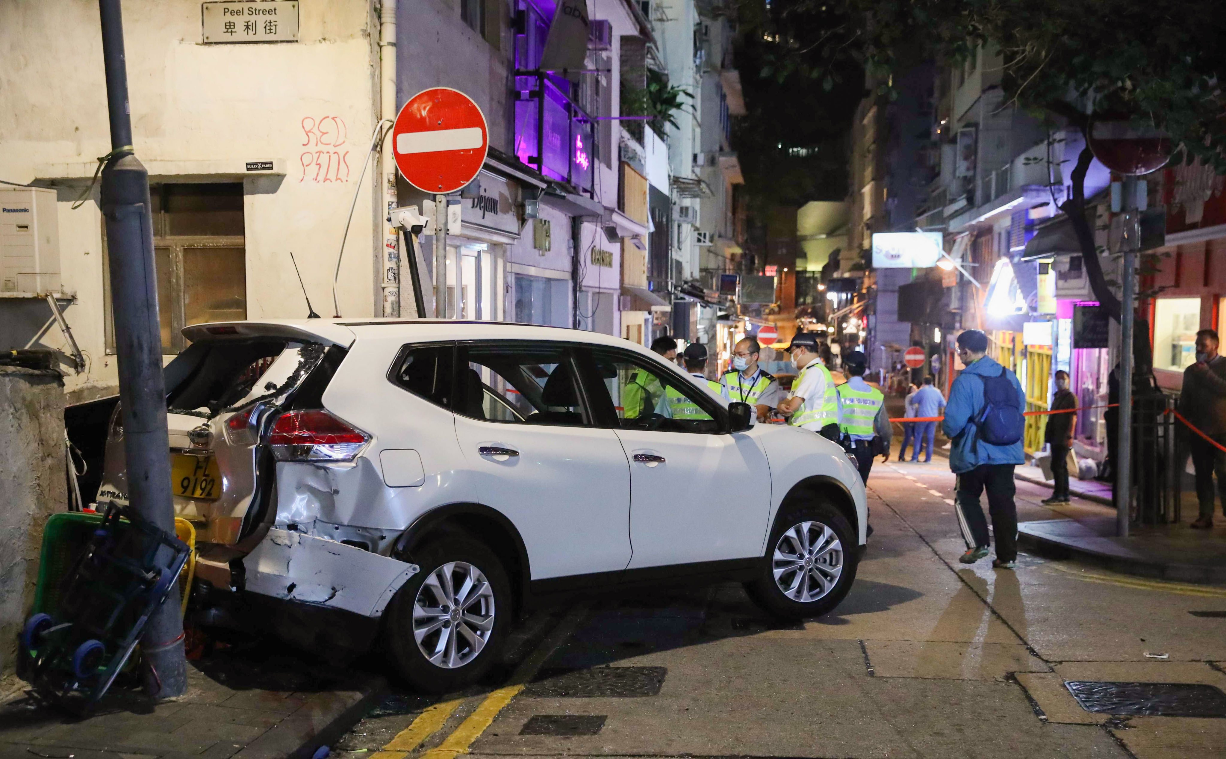 The unsecured car rolled down a slope on Peel Street and crossed Staunton Street, killing one person and injuring seven others. Photo: Edmond So