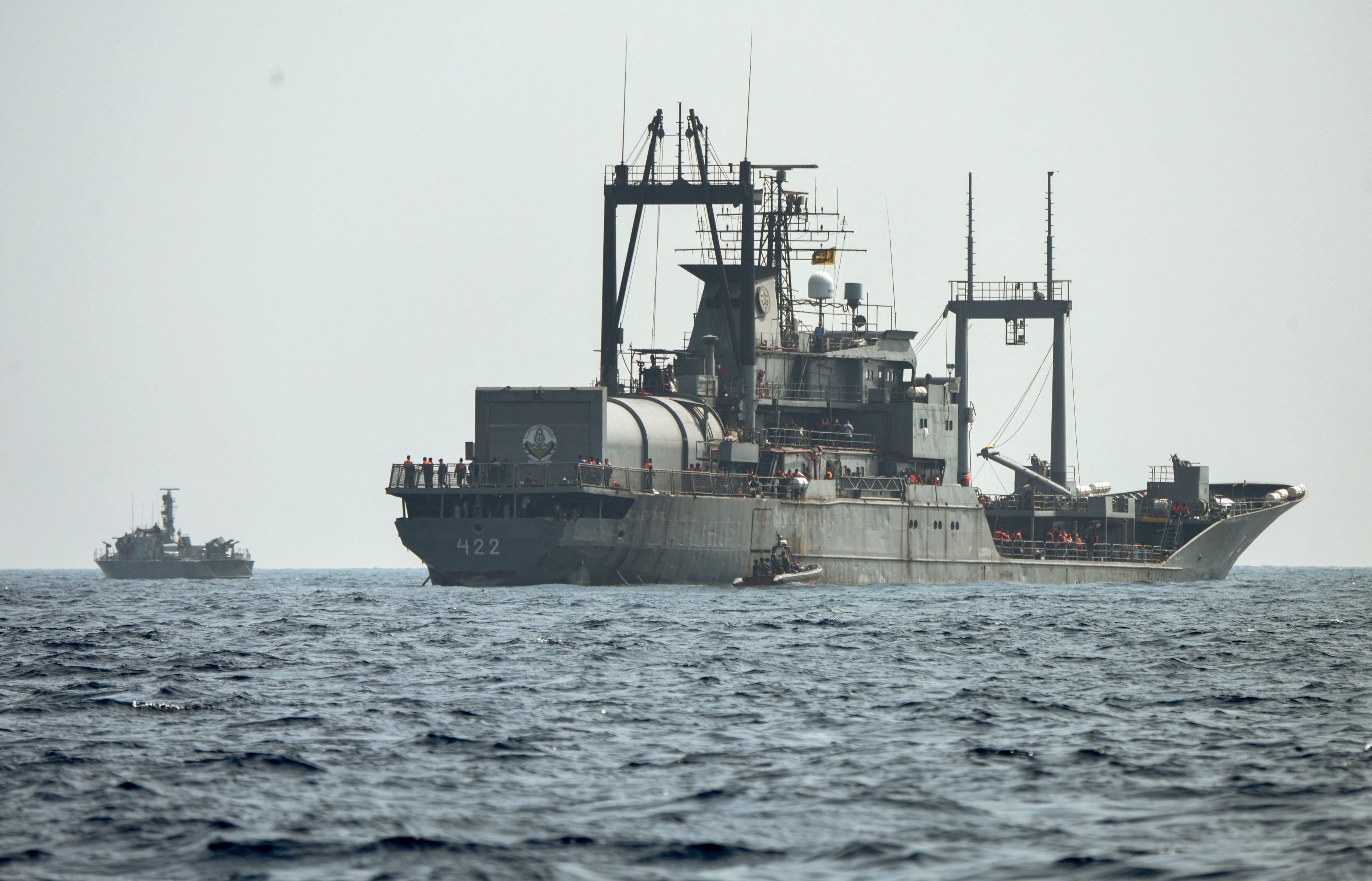 A Sri Lanka Navy vessel approaches an Iranian ship during a rescue operation off Sri Lanka’s coast on Friday. Photo: Handout via Reuters