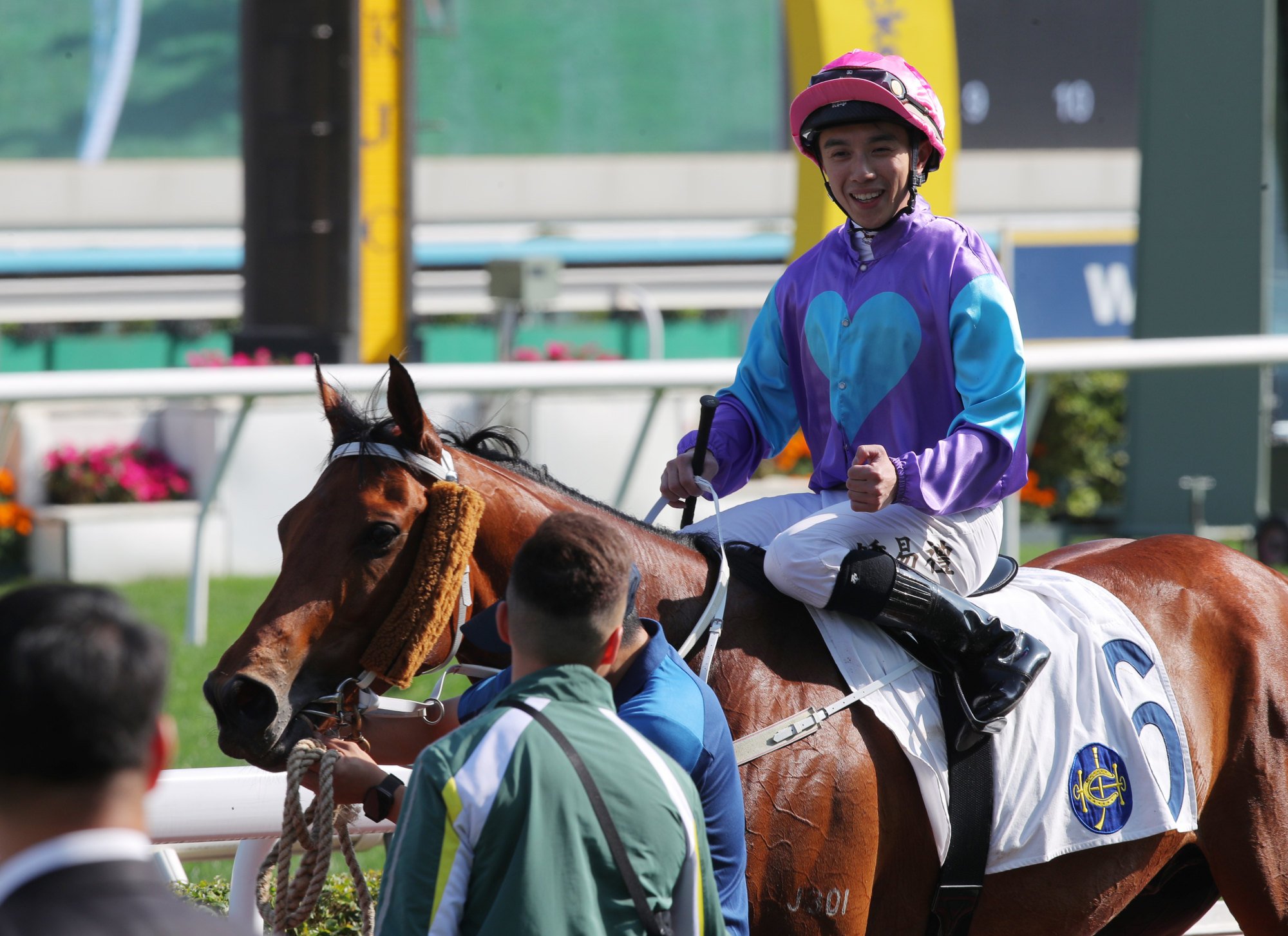 All smiles for Angus Chung as he arrives in the winners’ enclosure.