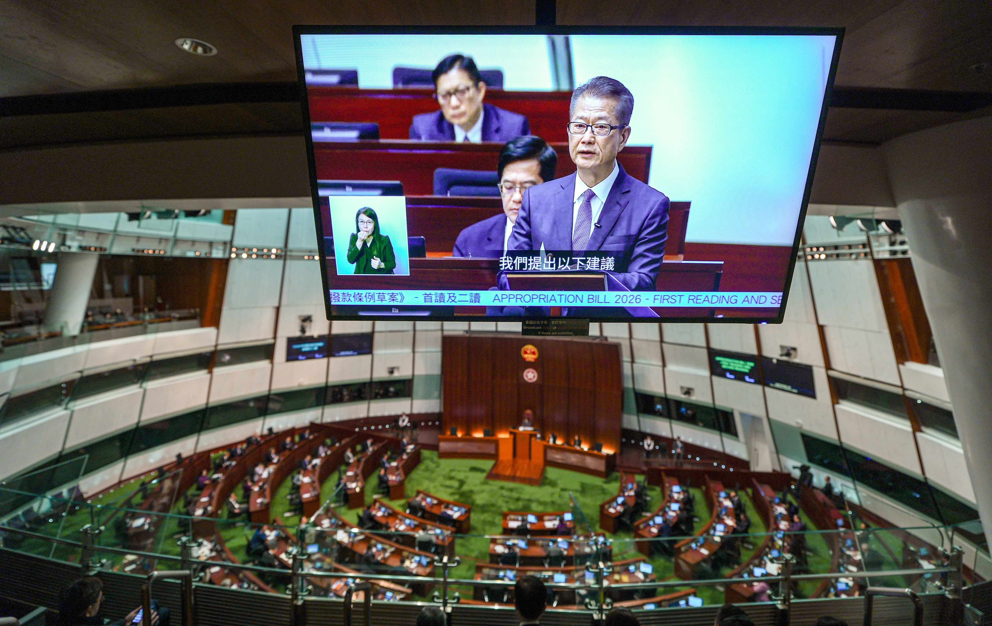 Financial Secretary Paul Chan delivers his budget address at the Legislative Council. Photo: Eugene Lee