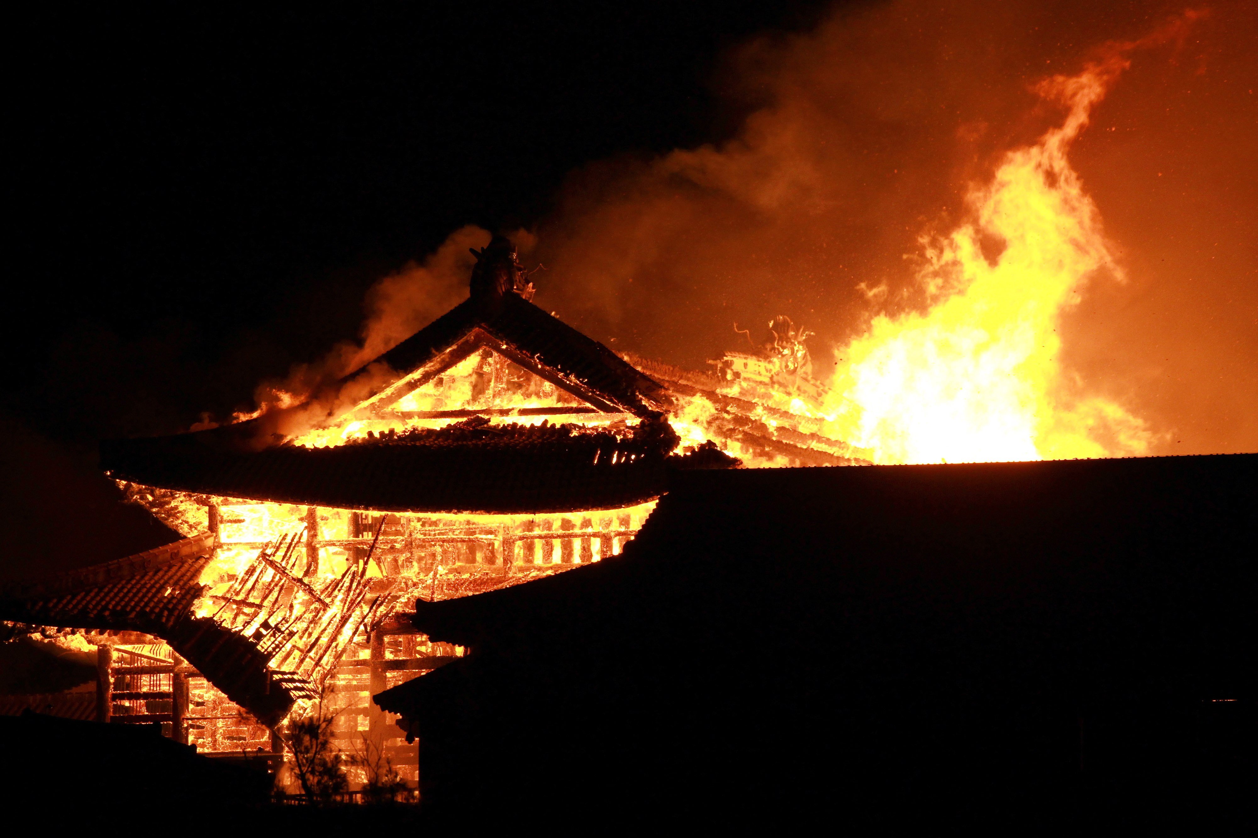 Flames engulf Shuri Castle in Naha, Okinawa prefecture, in October 2019. The fire destroyed several major structures at the Unesco World Heritage site. Photo: EPA-EFE