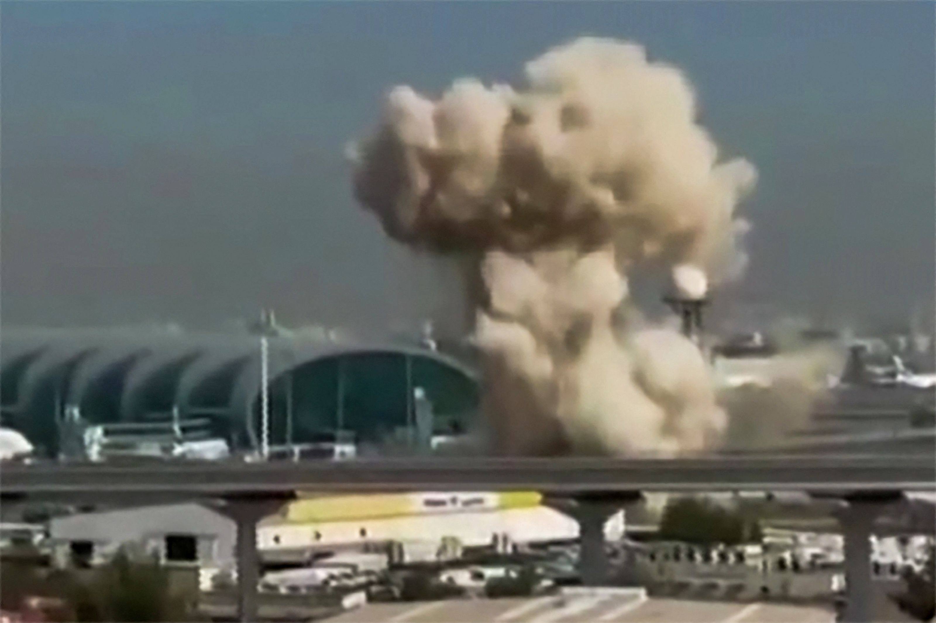 Smoke rising from the Dubai International Airport during attacks from Iran on Saturday. Photo: UGC/AFP