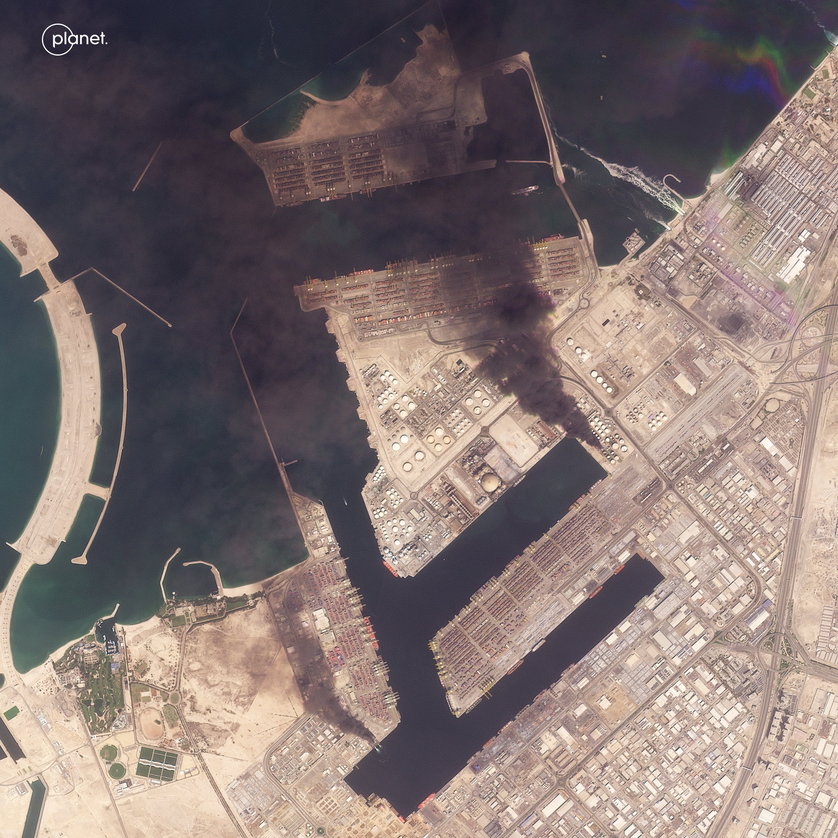 Smoke rises from Jebel Ali Port in Dubai, United Arab Emirates, on March 1. Photo: Planet Labs PBC via AP