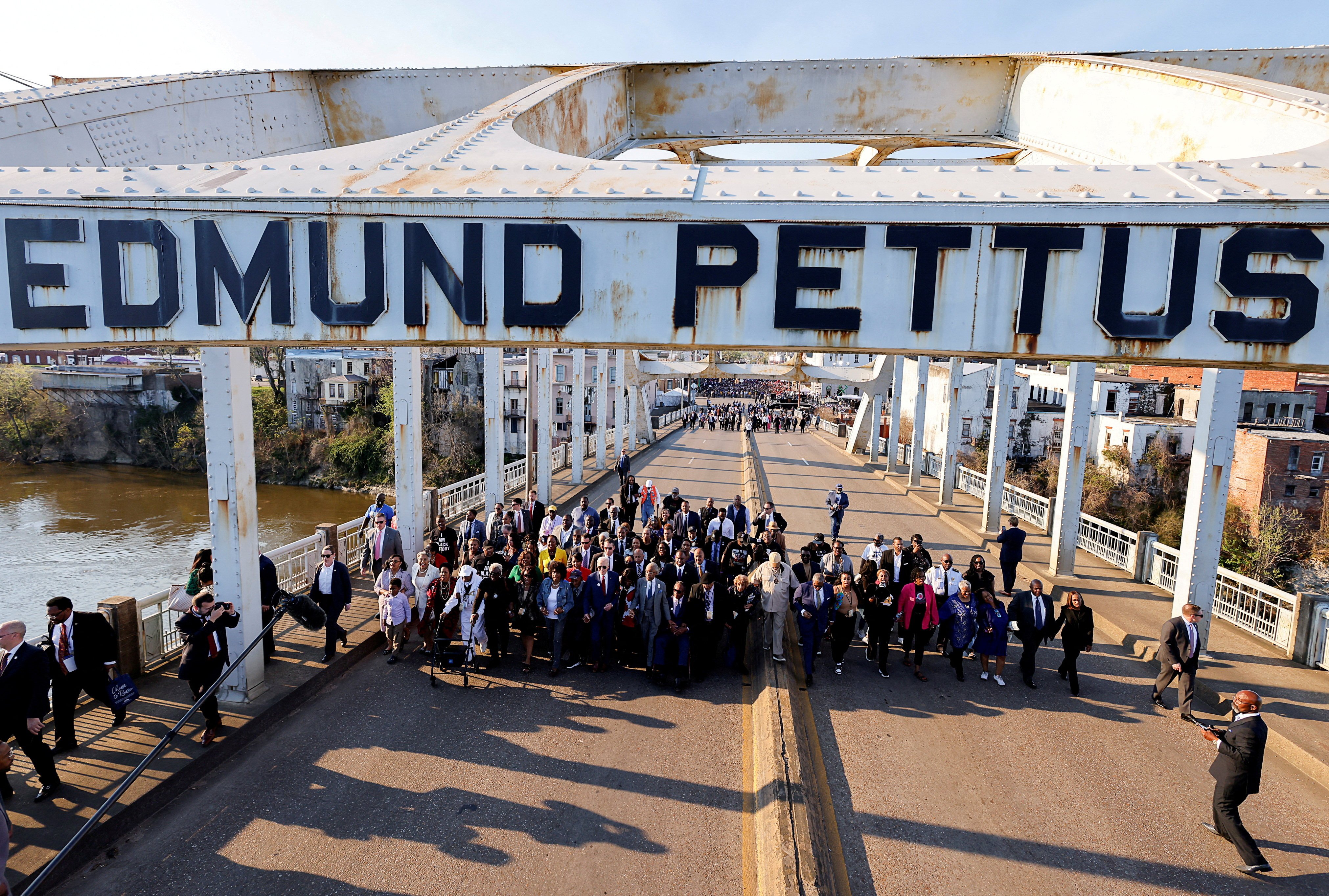 Politicians and activists participate in a commemorative march across the Edmund Pettus Bridge for the 58th anniversary of ‘Bloody Sunday’, when state troopers beat peaceful voting rights protesters who were marching across the bridge, in Selma, Alabama, on Thursday. Photo: Reuters