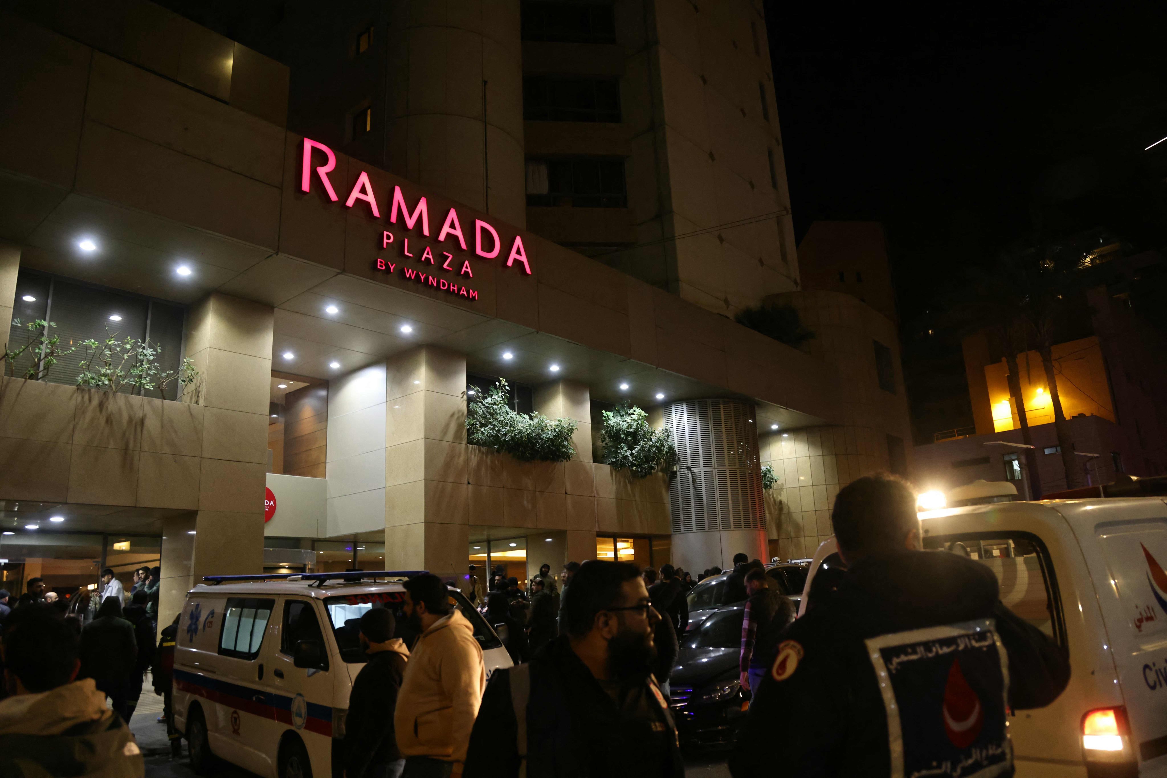 First responders gather at a Ramada hotel that was targeted by an Israeli strike, in Beirut’s seaside Raouche area on Sunday. Photo: AFP