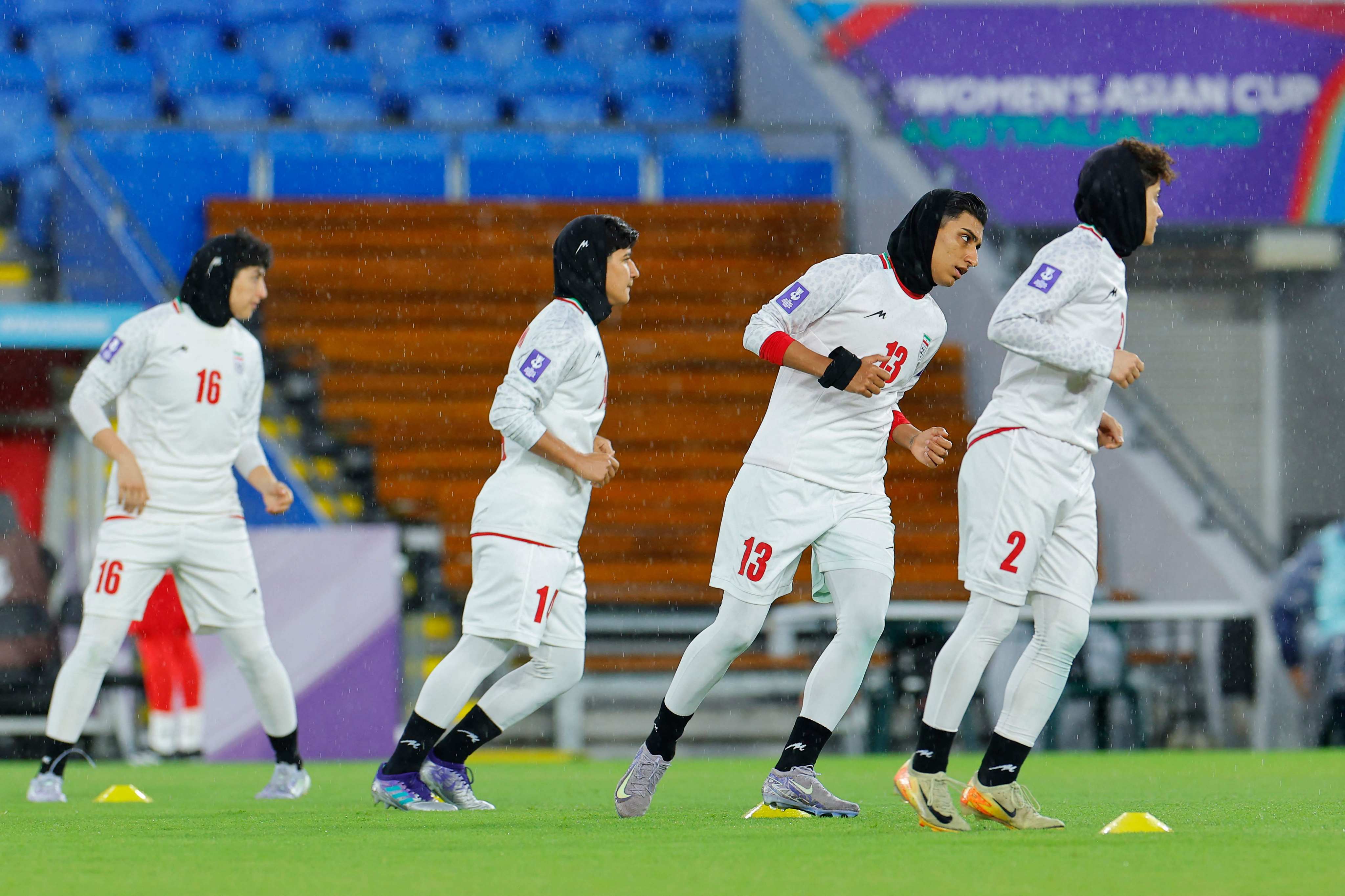 Iranian players warm up before the AFC Women’s Asian Cup Australia 2026 football match between Iran and the Philippines on the Gold Coast on Sunday. Photo: AFP