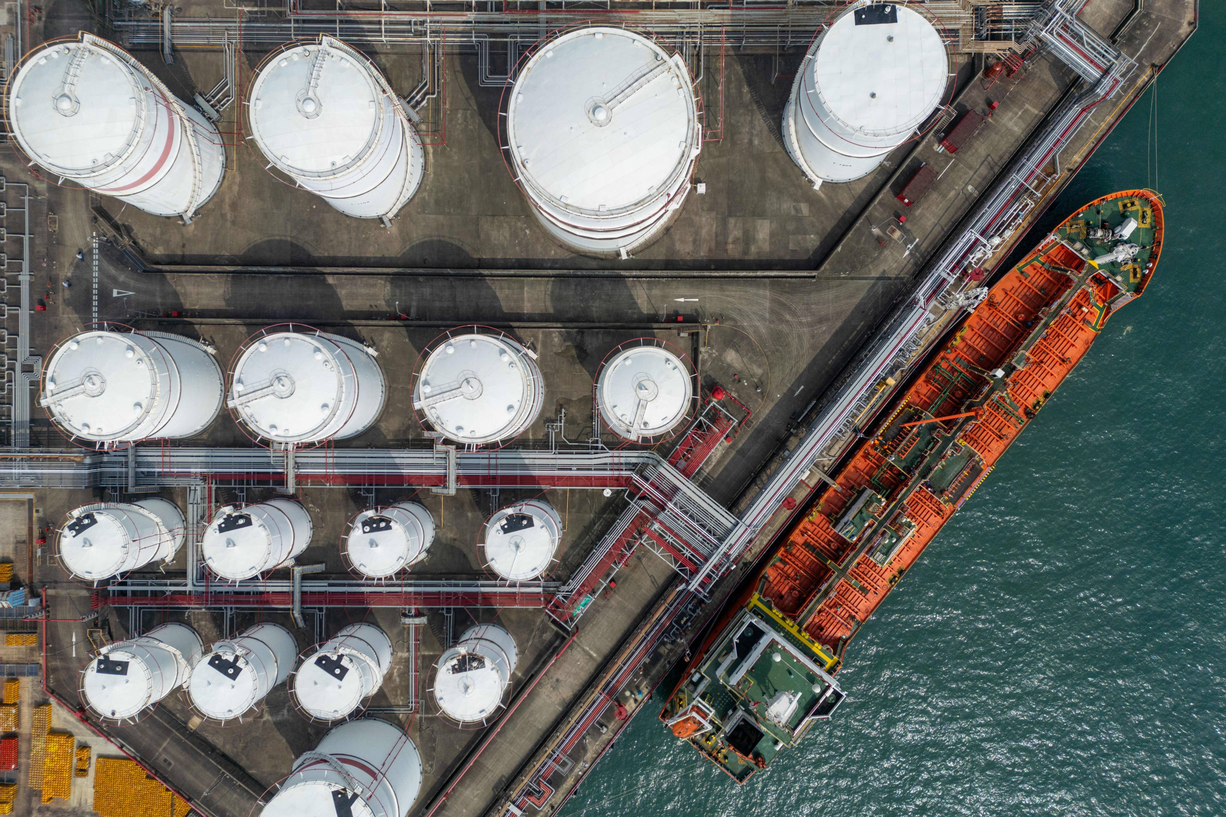 An oil tanker docked next to storage tanks in Hong Kong. Photo: dpa