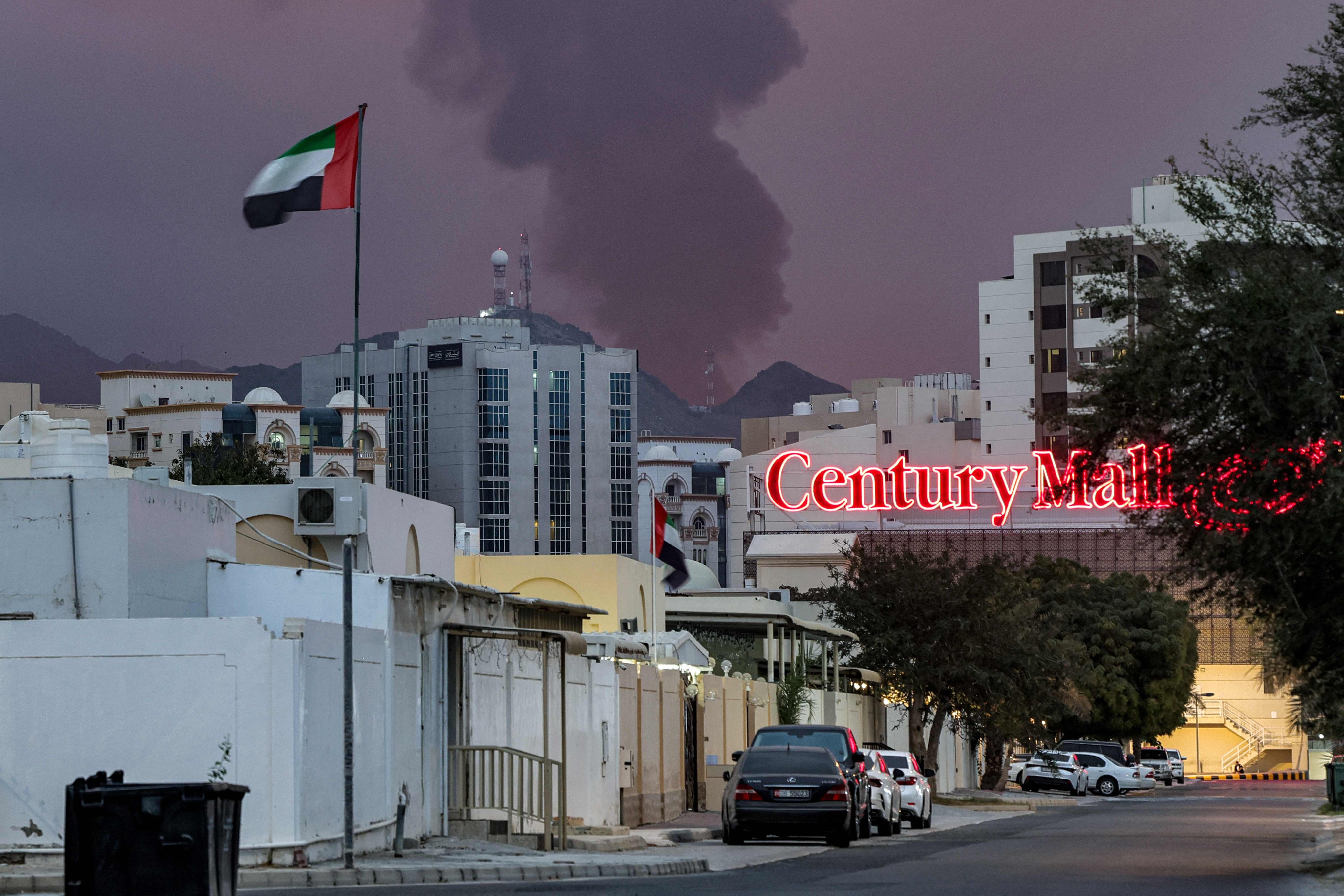 A plume of black smoke rises from the port of Fujairah in United Arab Emirates on Wednesday last week following a suspected Iranian strike. Photo: AFP
