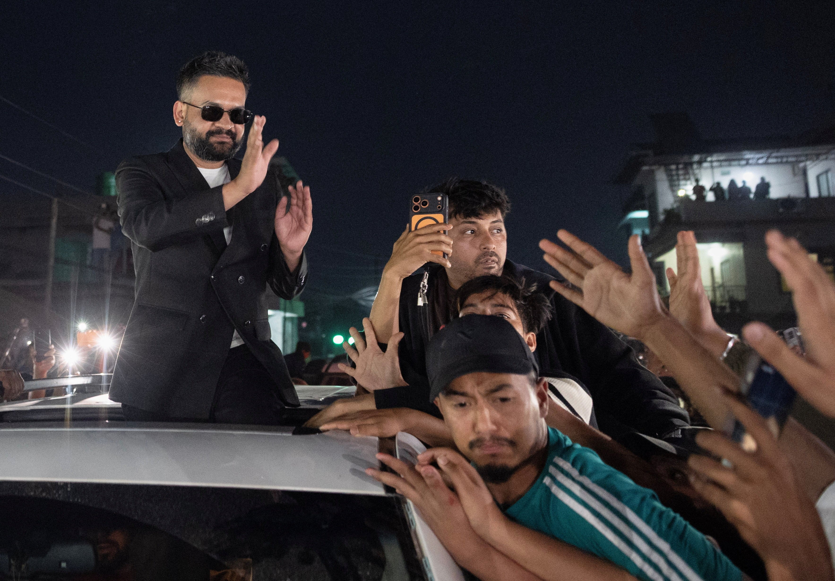 Balendra Shah greets supporters in Damak, Jhapa district, on March 7 after winning the election. Photo: Reuters