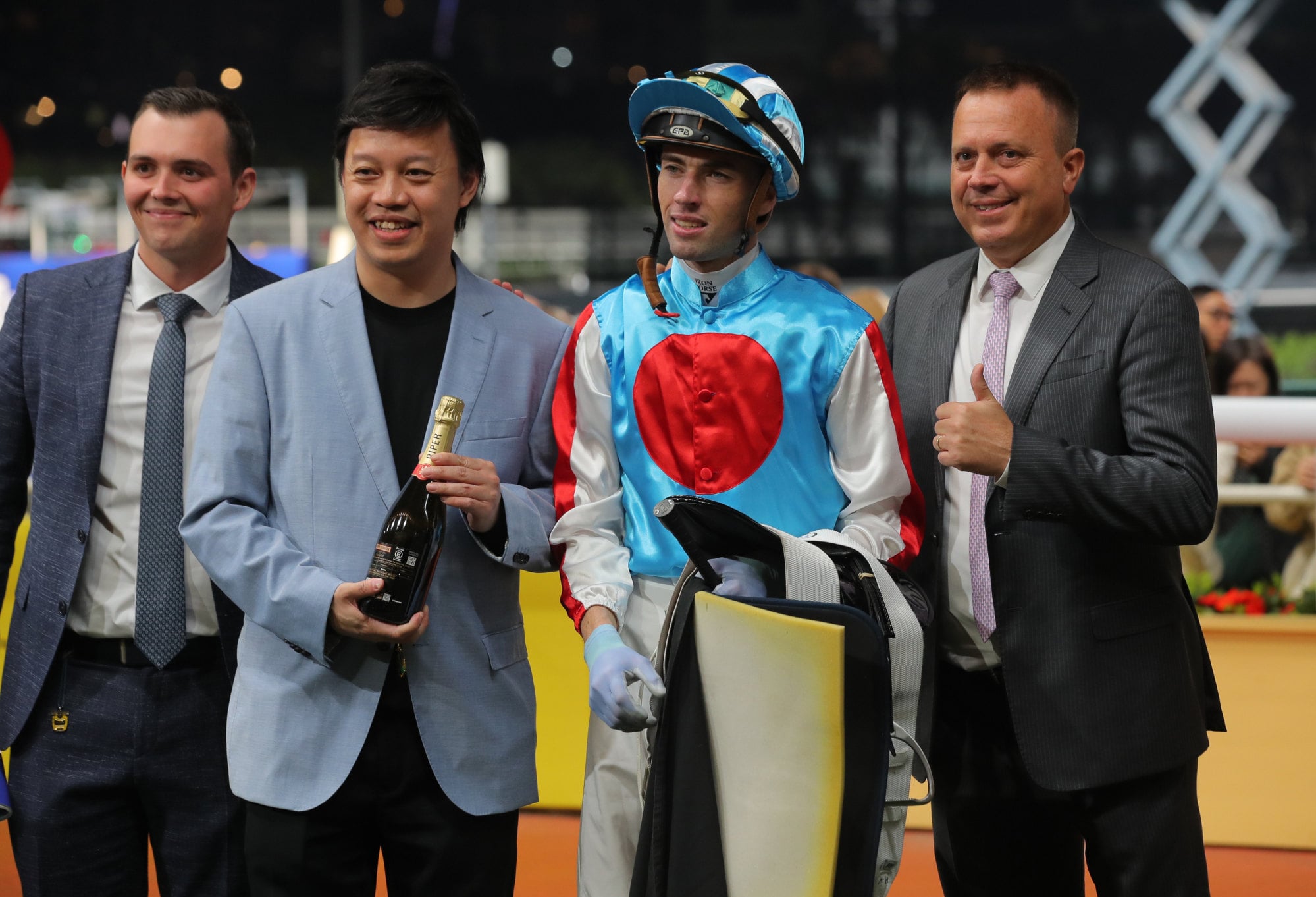 Trainer Caspar Fownes (right), jockey James Orman and connections of Somelovefromabove celebrate his latest Valley victory.