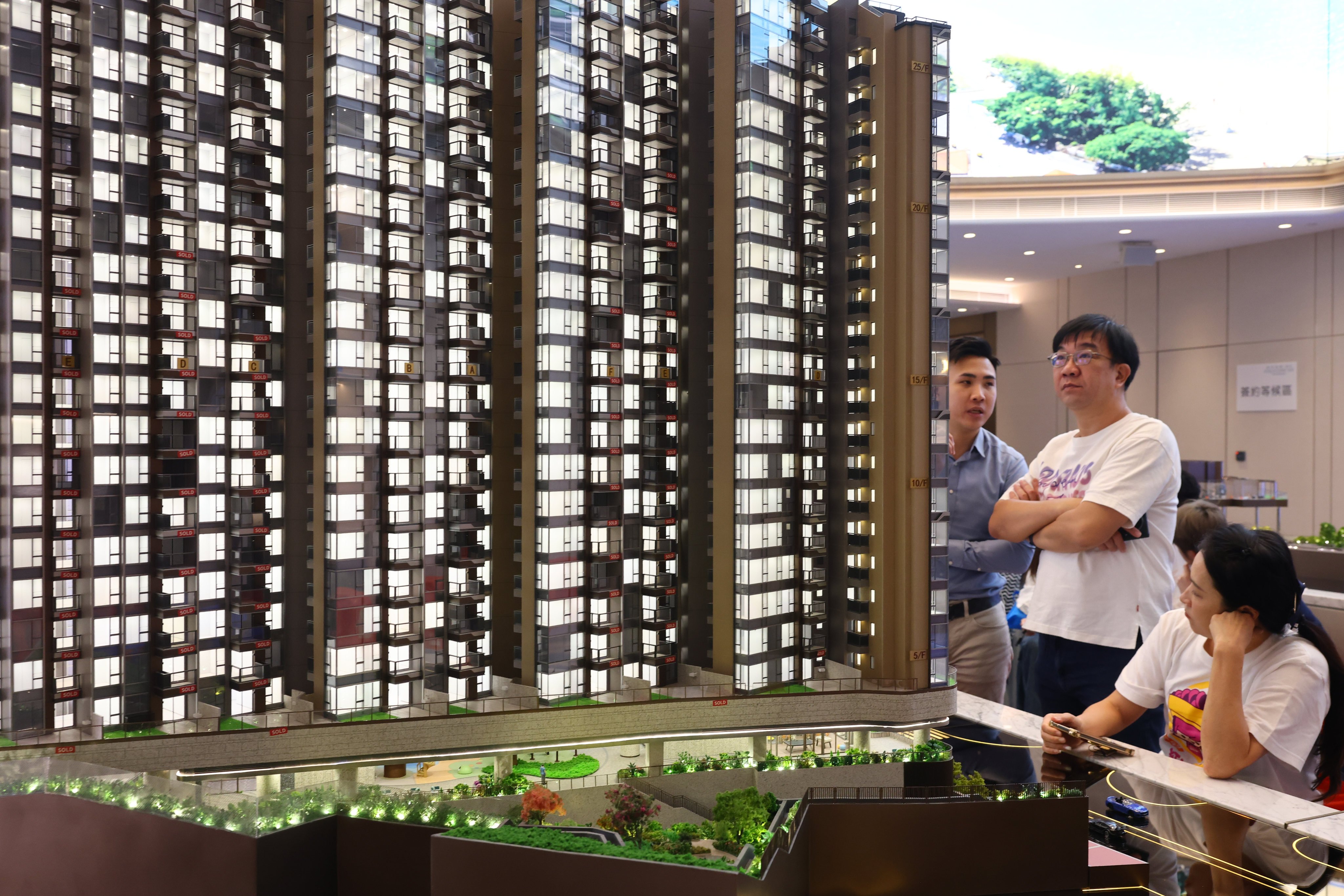 Potential homebuyers visit a development sales office in Hong Kong on November 15, 2025. Photo: Dickson Lee