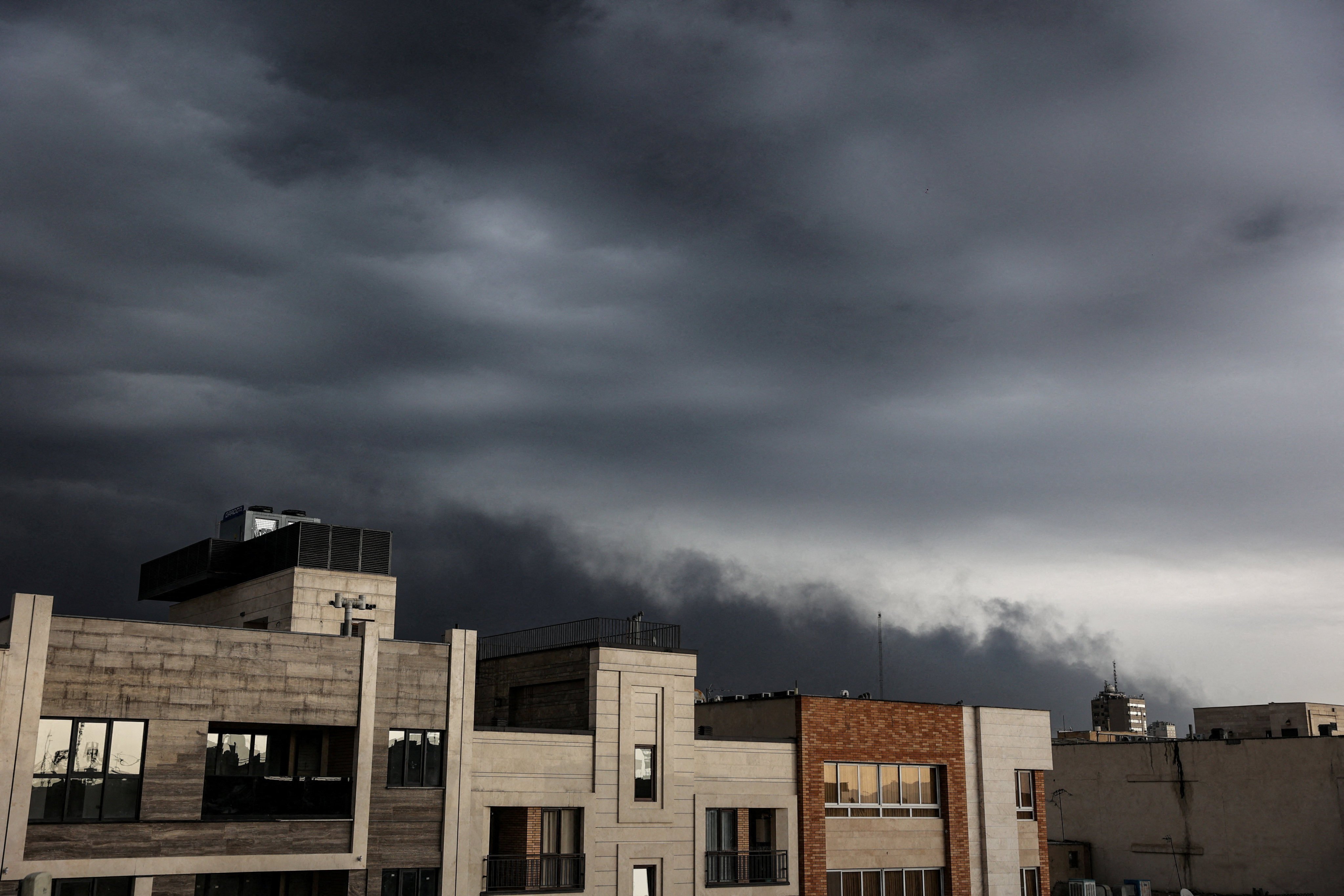 Smoke continues to rise after a reported strike on fuel tanks in an oil refinery, amid the US-Israeli conflict with Iran, in Tehran, Iran, on Sunday. Photo: WANA via Reuters