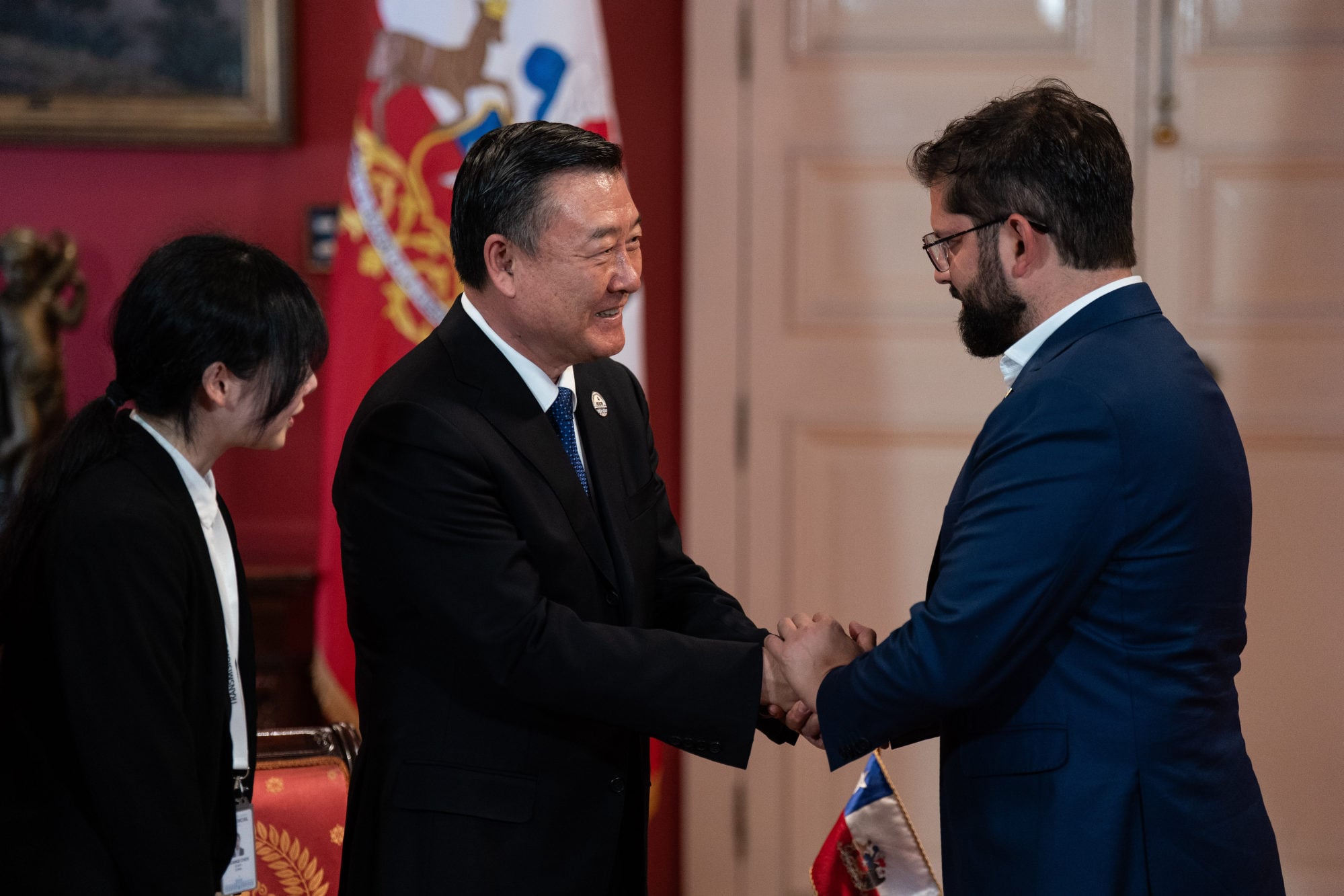 Ni Hong, China’s Minister of Housing and Urban-Rural Development, meets Chilean President Gabriel Boric at the La Moneda presidential palace in Santiago on Wednesday. Photo: Handout