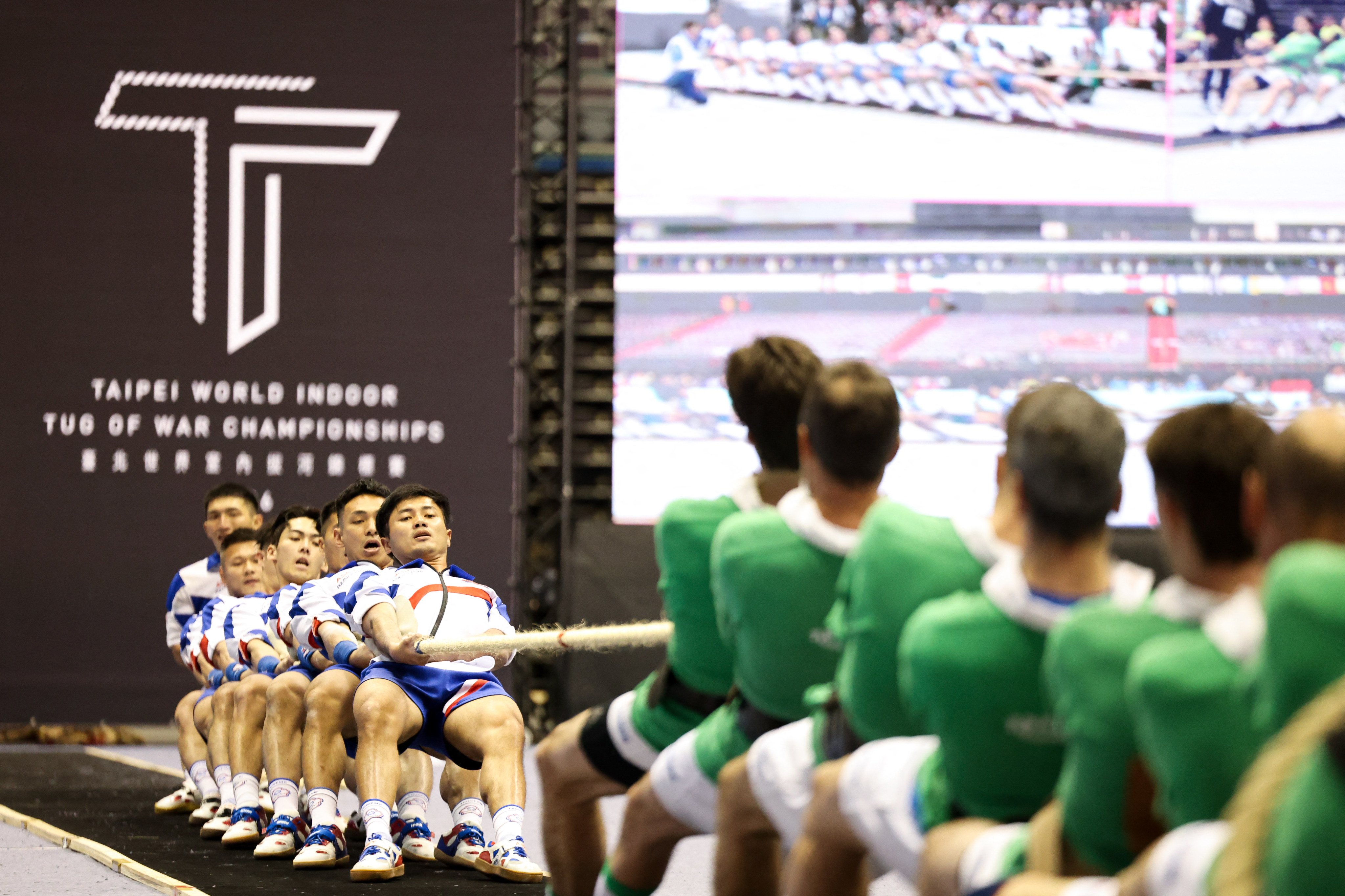 Taiwans junior mens tug-of-war team competes against the Basque Country in Taipei World Indoor Tug of War Championships, in Taipei on March 12, 2026. (Photo by I-Hwa Cheng / AFP)