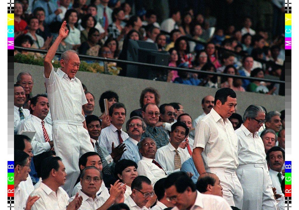 Statesman Lee Kuan Yew waves to the crowd at the National Day celebration in Singapore on August 9, 1996. Photo: AFP