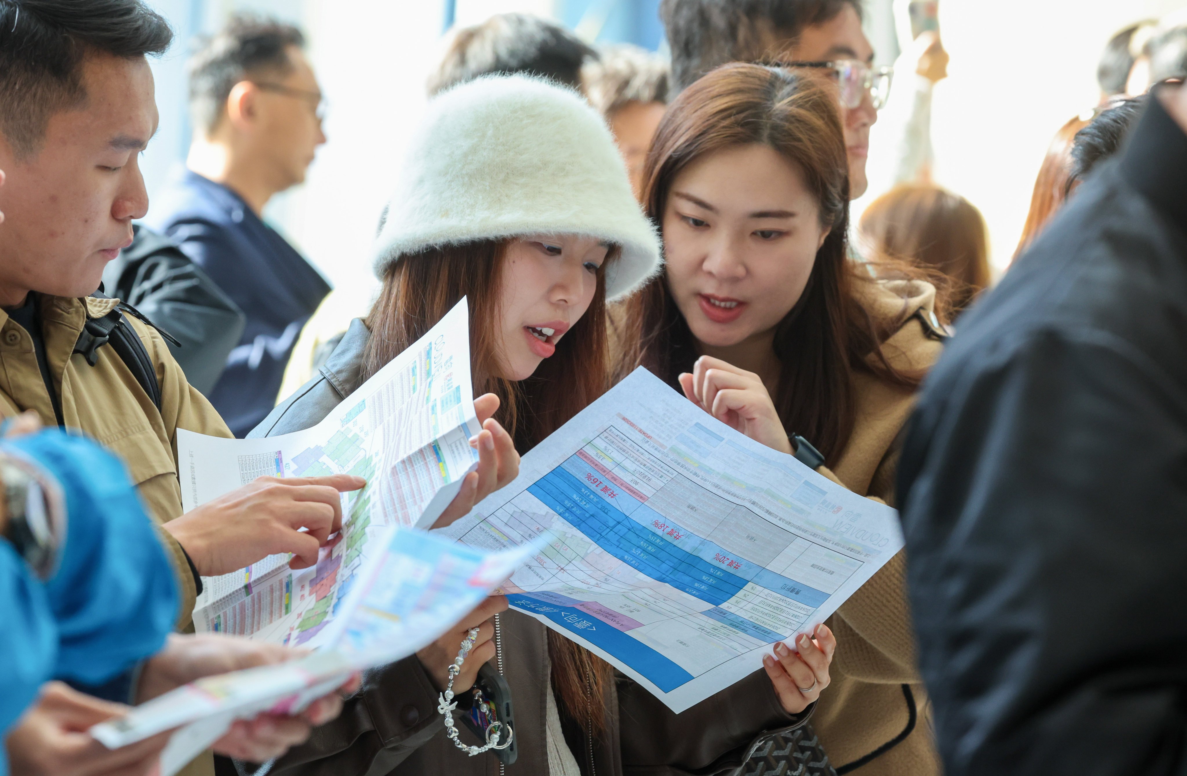 Prospective buyers for the Cloudview project on Saturday. Wing Tai sold 149 of the 200 units released in the first round of sales for its Sheung Shui development. Photo: Dickson Lee