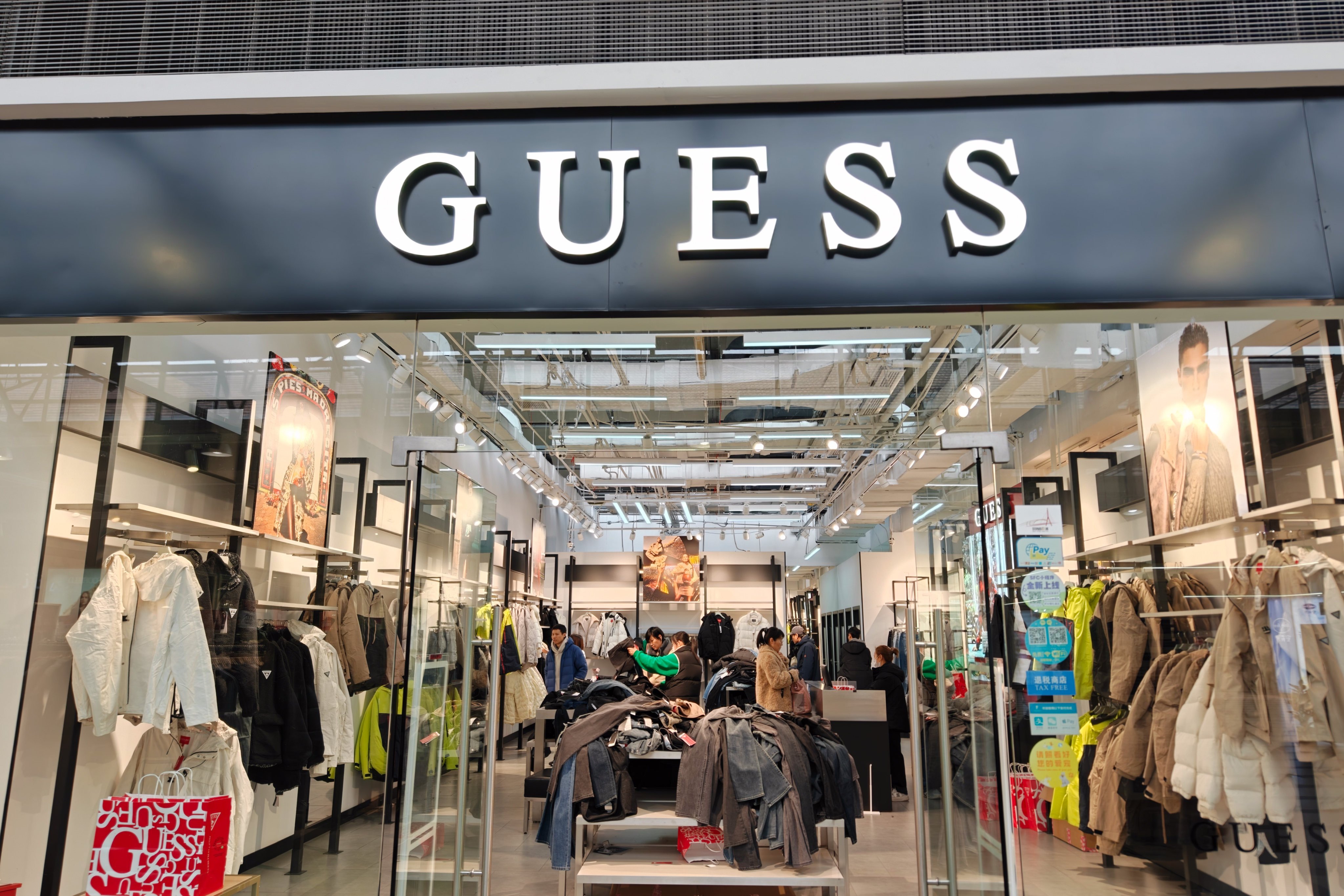 A Guess outlet in Nanjing, Jiangsu province, China. After two decades, the fashion outlet says it is calling it quits in mainland China. Photo: Getty Images