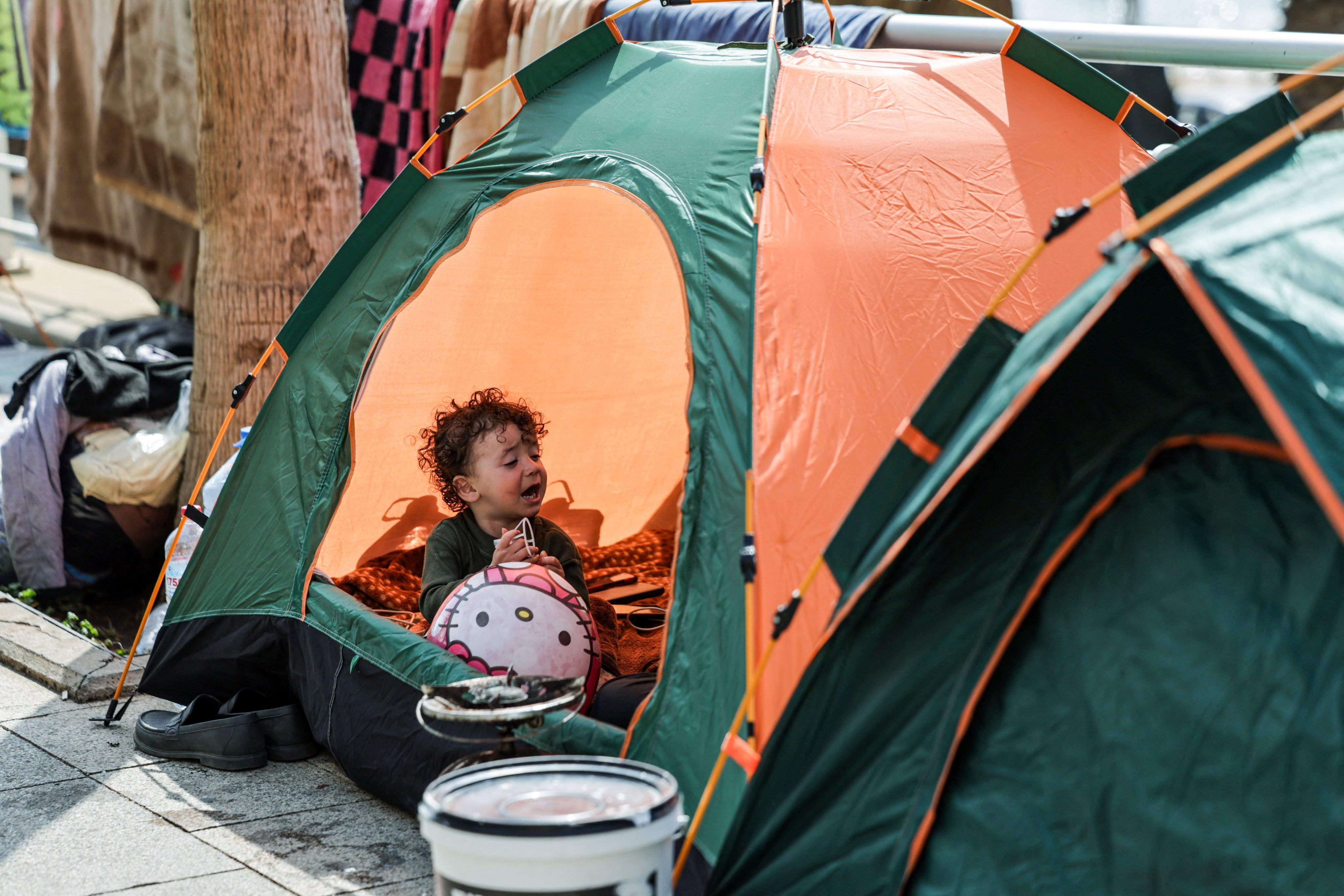 A displaced child sits inside a roadside tent by the sea, following an escalation between Hezbollah and Israel amid the US-Israeli conflict with Iran, in Beirut, Lebanon, on Friday. Photo: Reuters