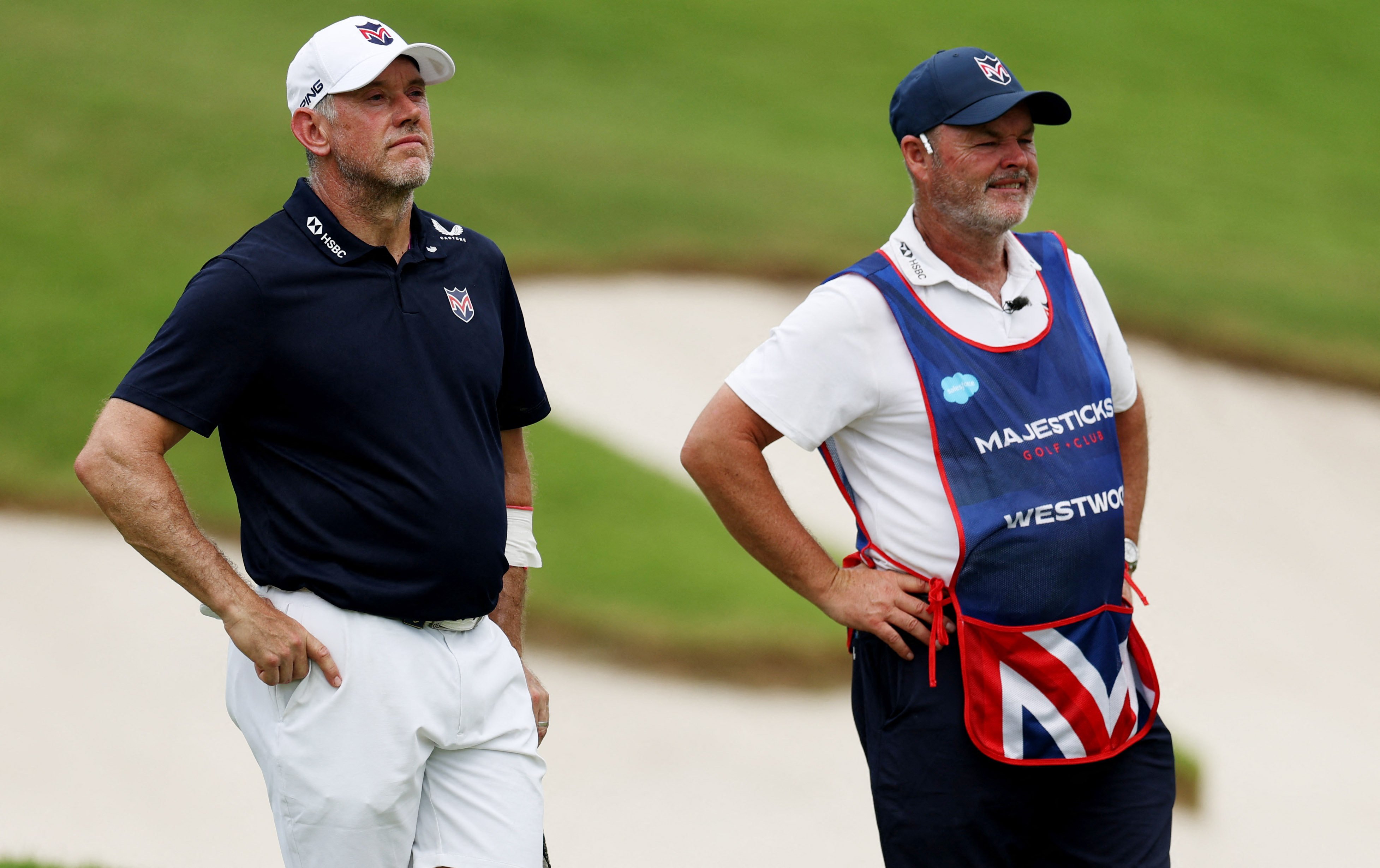 Lee Westwood (left) with his caddie during the third round of LIV Golf Singapore at Sentosa Golf Club on Saturday. Photo: Reuters
