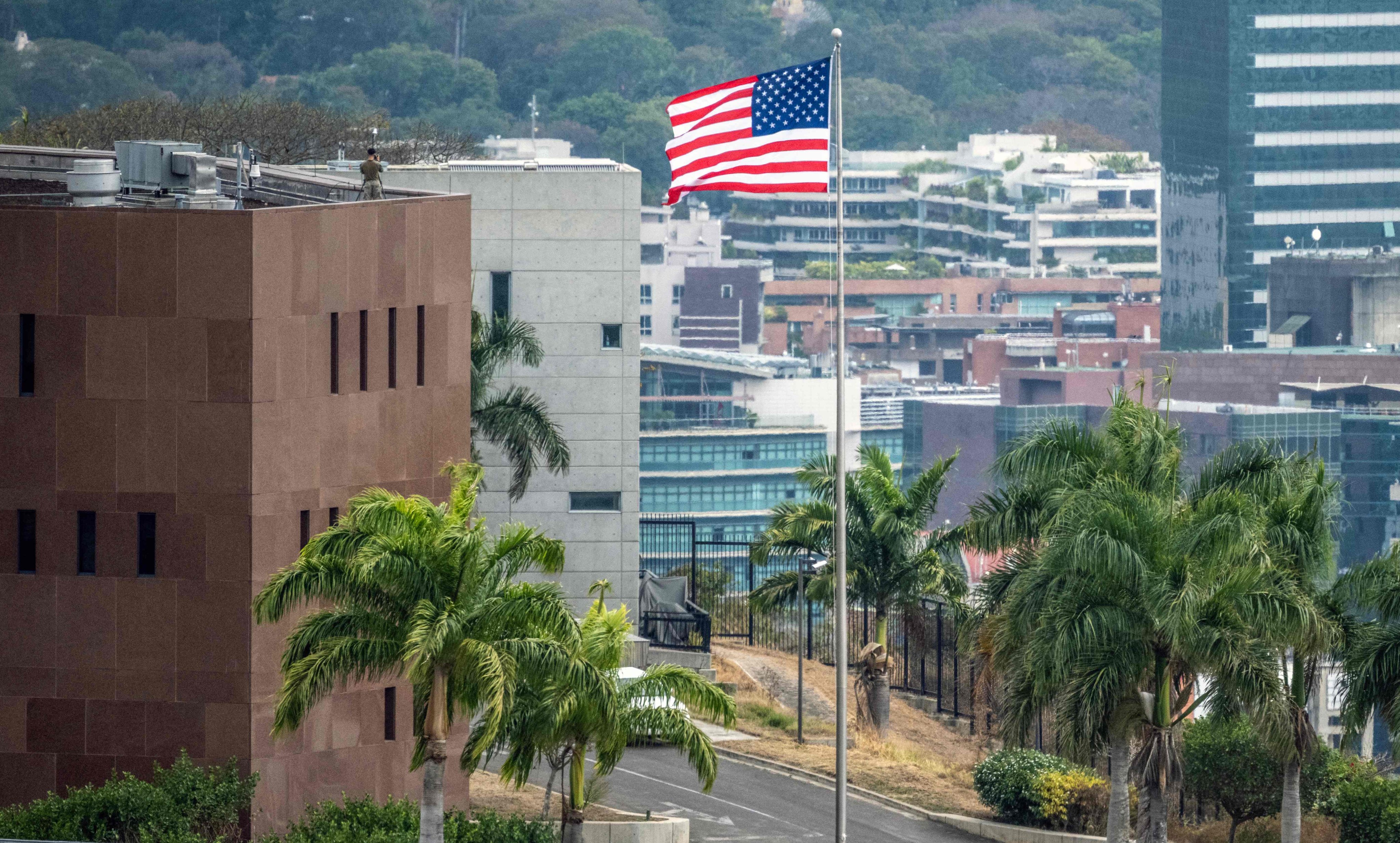 The US flag flutters at the US embassy in Caracas on Saturday. Photo: AFP