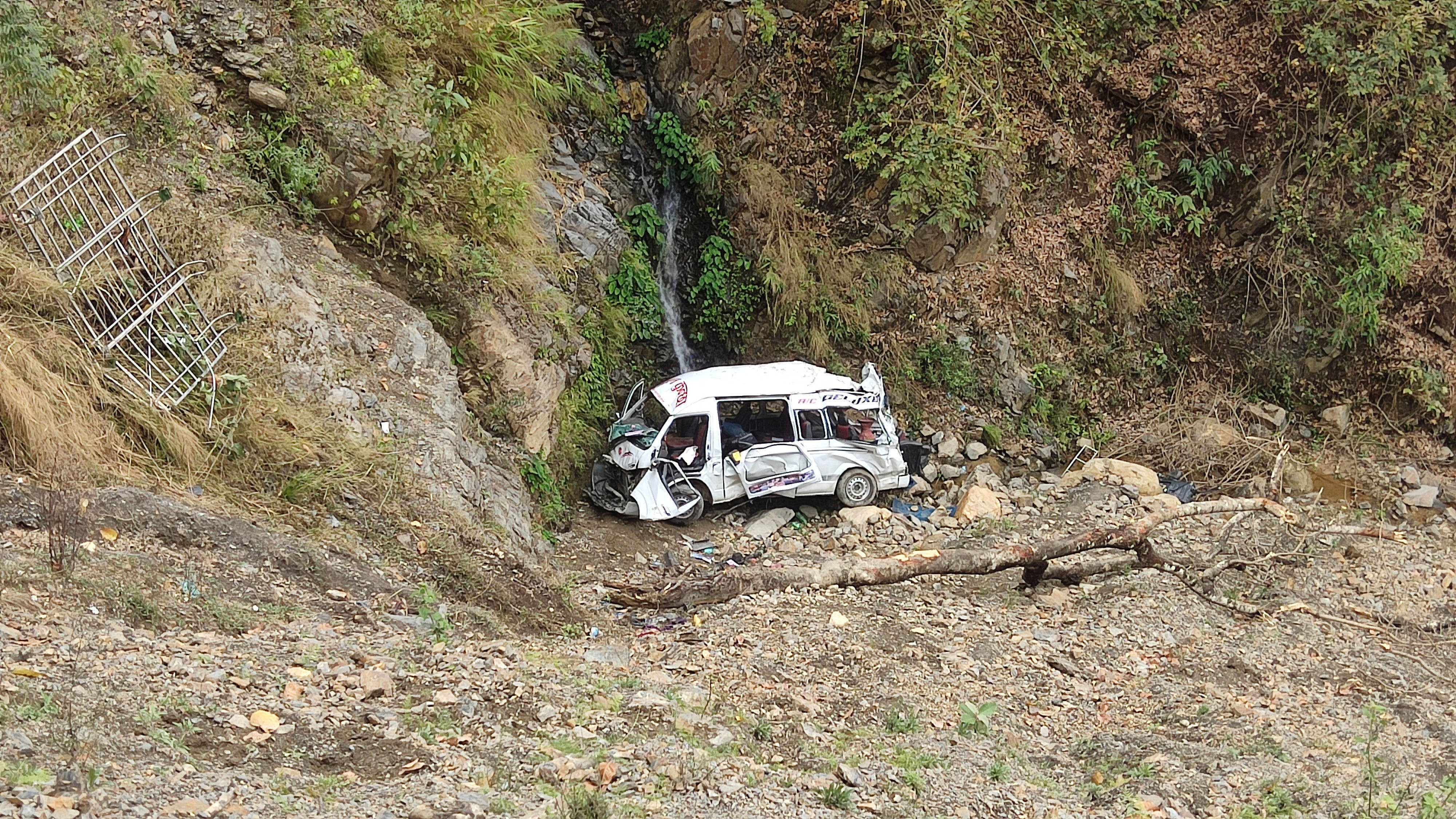 The wreckage of a bus that rolled down a mountain slope, killing seven, sits at Shahid Lakhan village, west of Nepal’s capital Kathmandu, on Sunday. Photo: AP