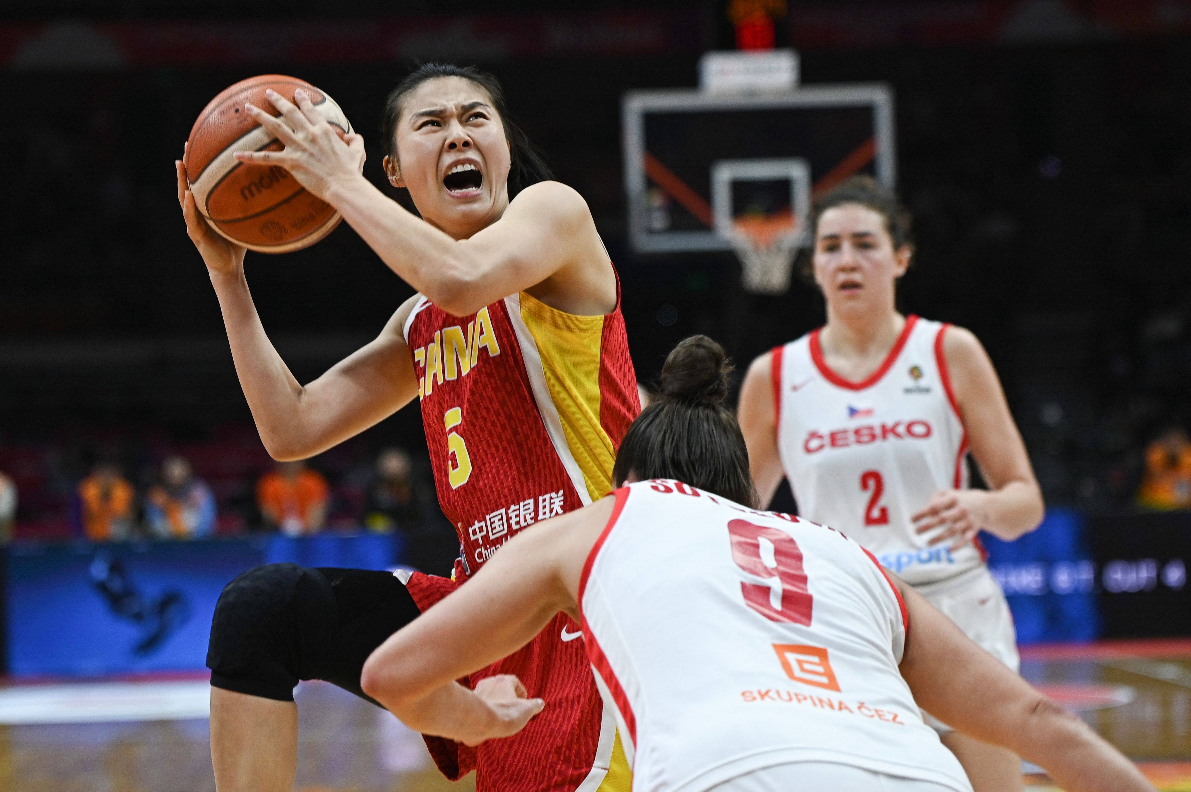 Guard Wang Siyu (left) scored nine consecutive points to seal China’s win over the Czech Republic at the Fiba World Cup qualifying tournament in Wuhan on Sunday. Photo: AFP