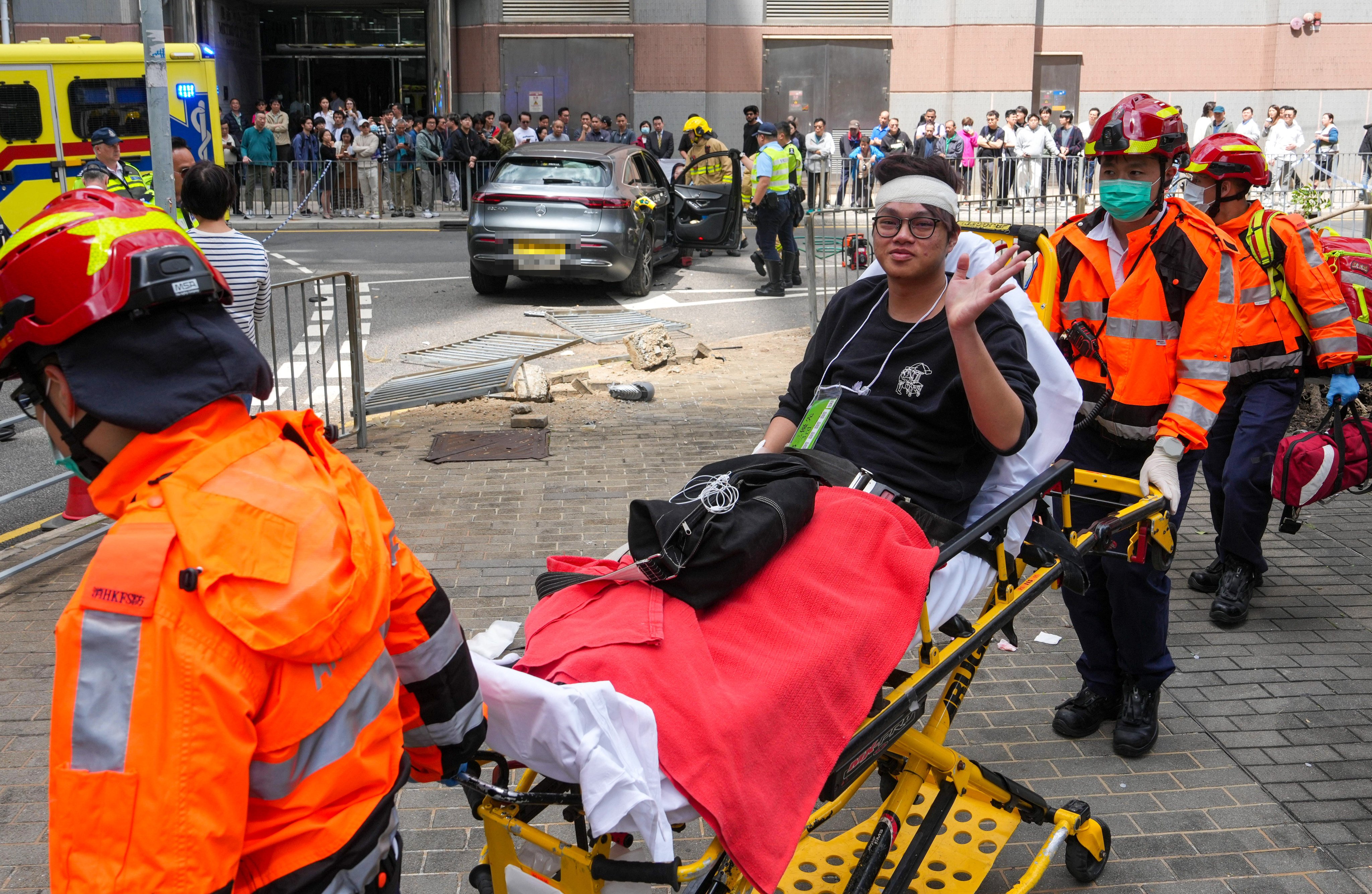 Nine people have been taken to hospital after a car mounted the pavement on Lam Hing Street in Kowloon Bay. Photo: Sam Tsang