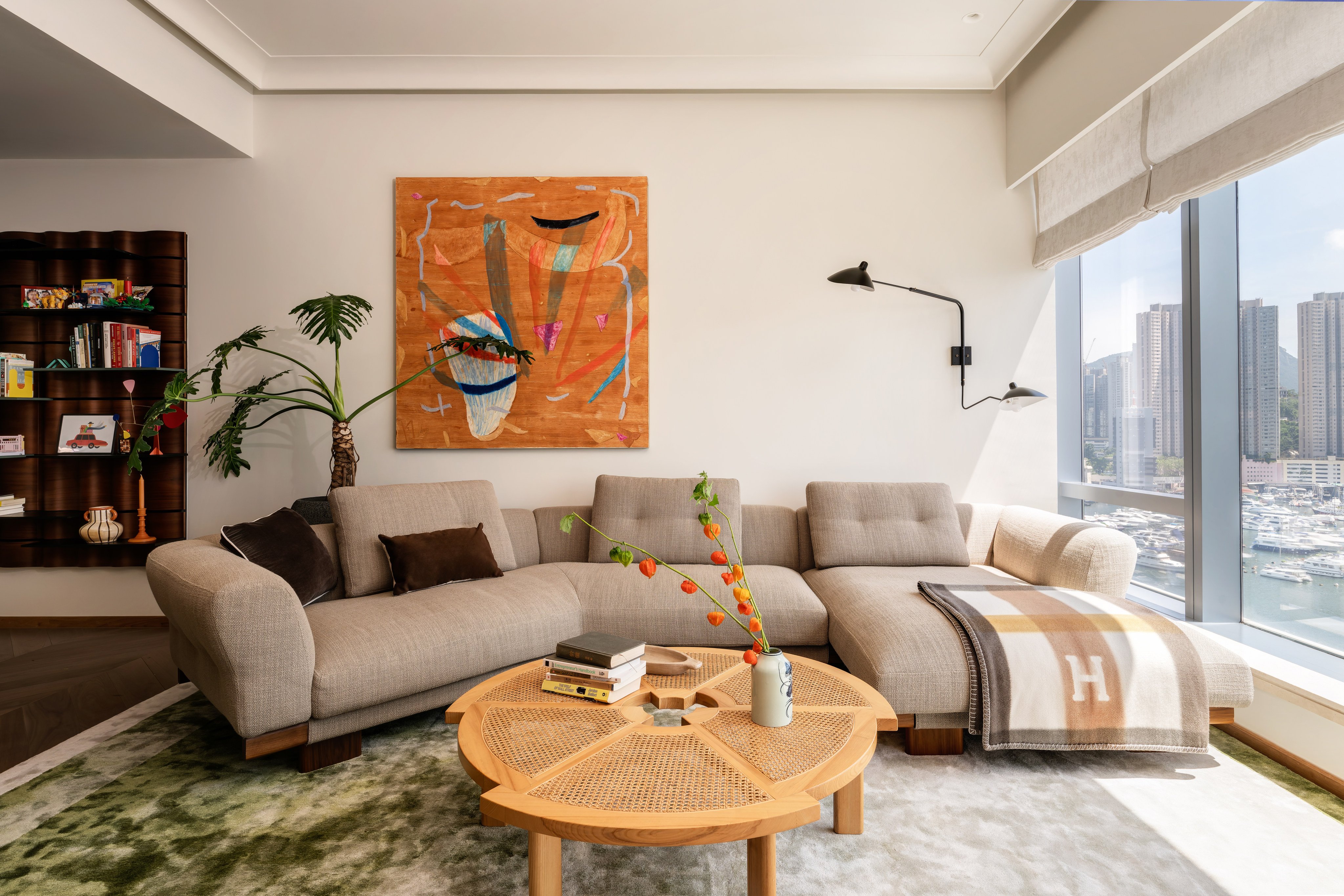 The living room in the Ap Lei Chau apartment in Hong Kong, designed by Stylus Studio. Photo: Steven Ko