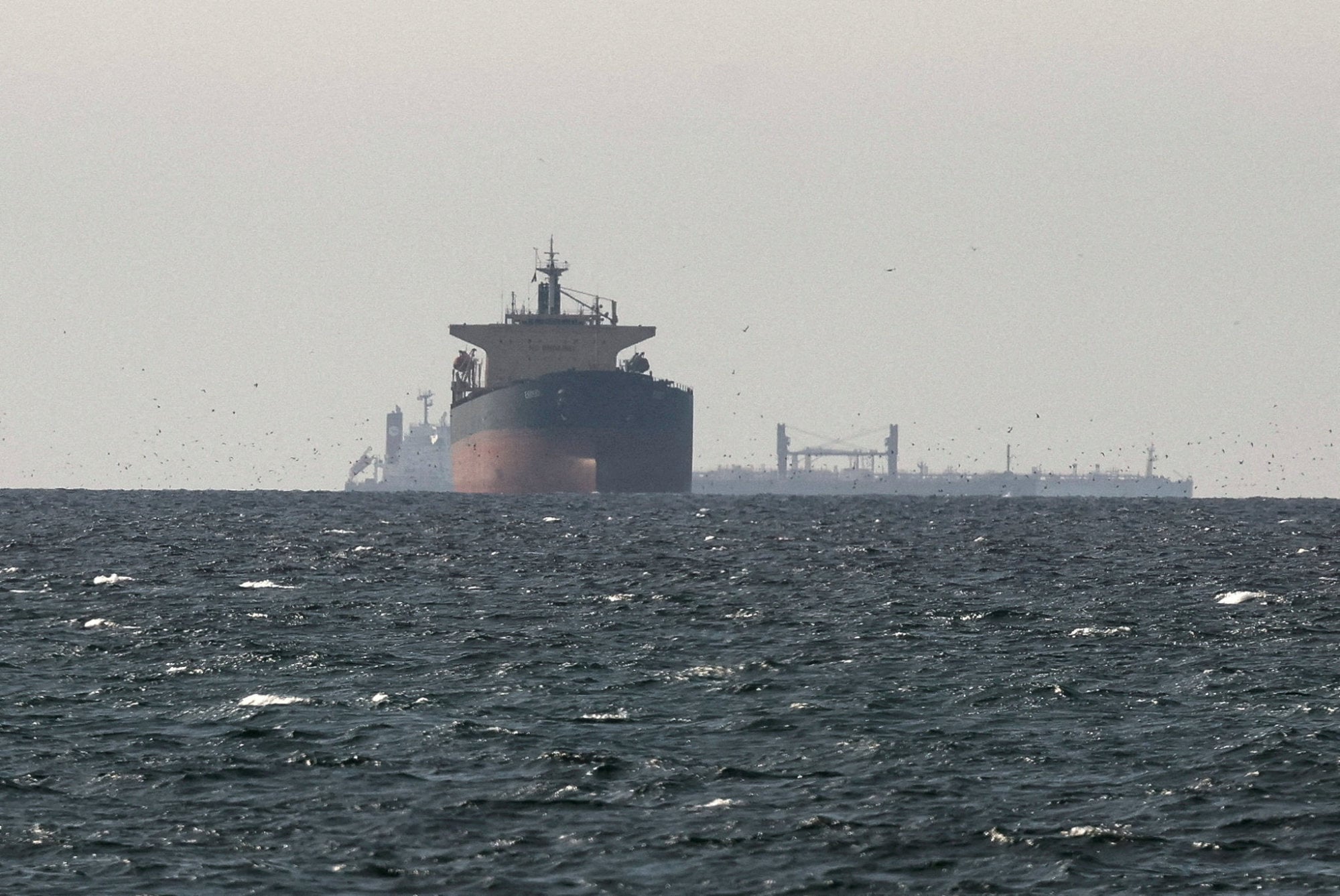 Tankers sail in the Gulf, near the Strait of Hormuz, as seen from northern Ras al-Khaimah, the United Arab Emirates. Photo: Reuters