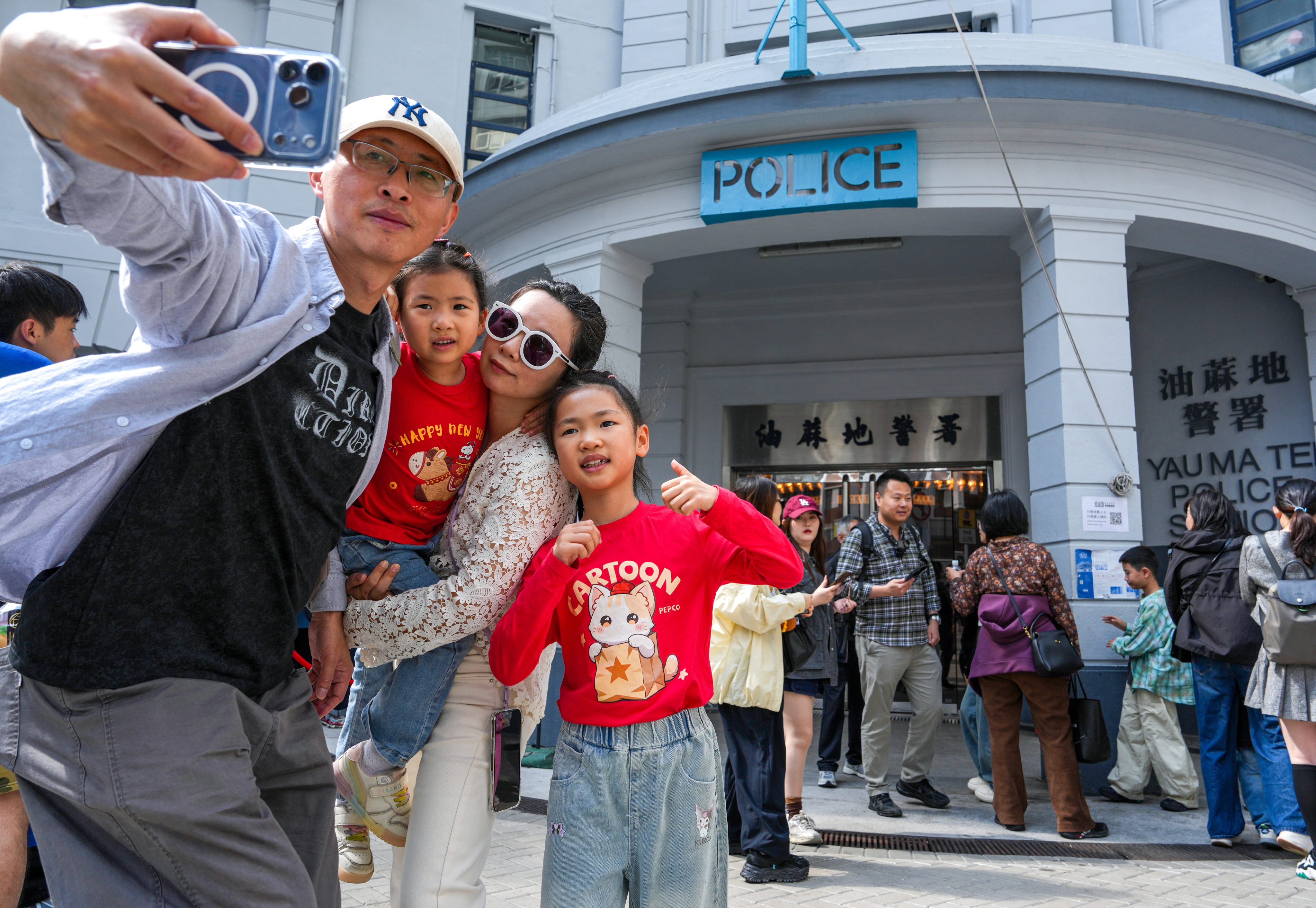 Mainland Chinese tourists visit the former Yau Ma Tei police station. Photo: Sam Tsang