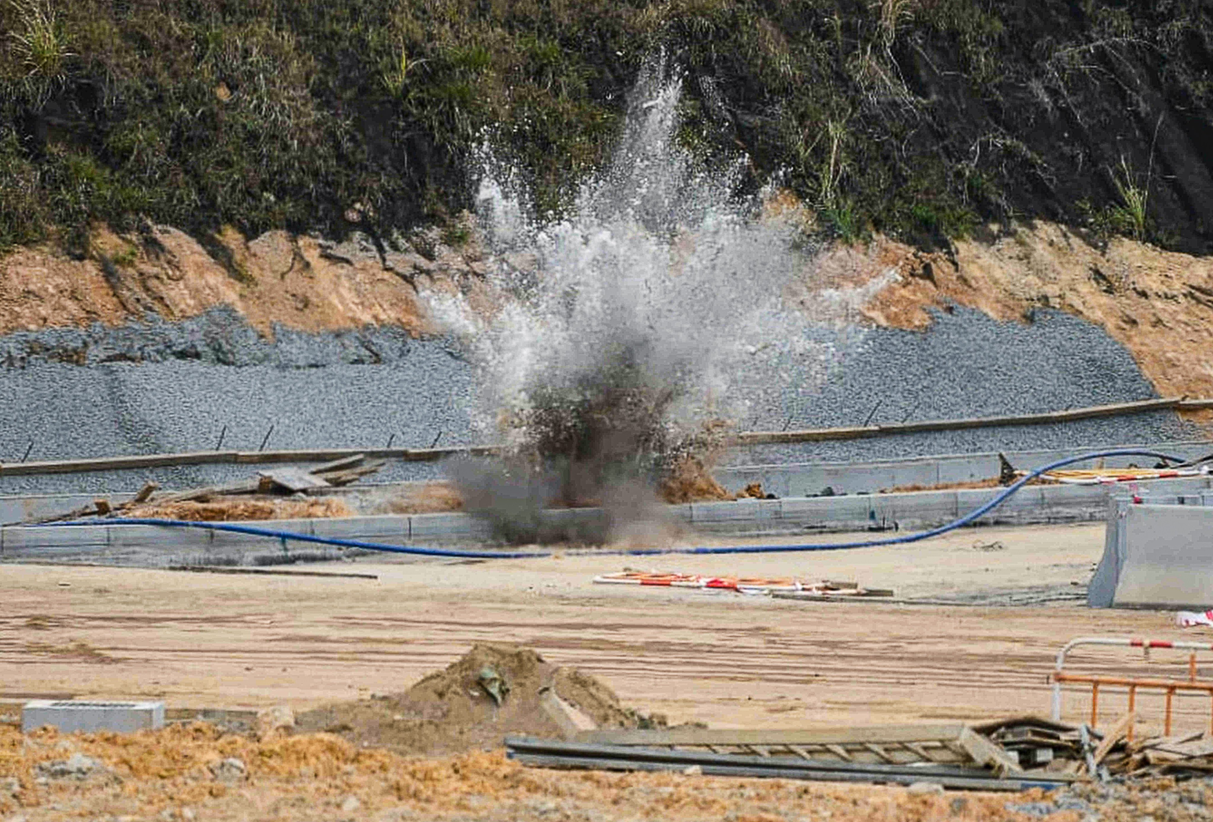 The suspected wartime mortar round was safely detonated by bomb disposal officers at the construction site in Kwu Tung. Photo: Handout