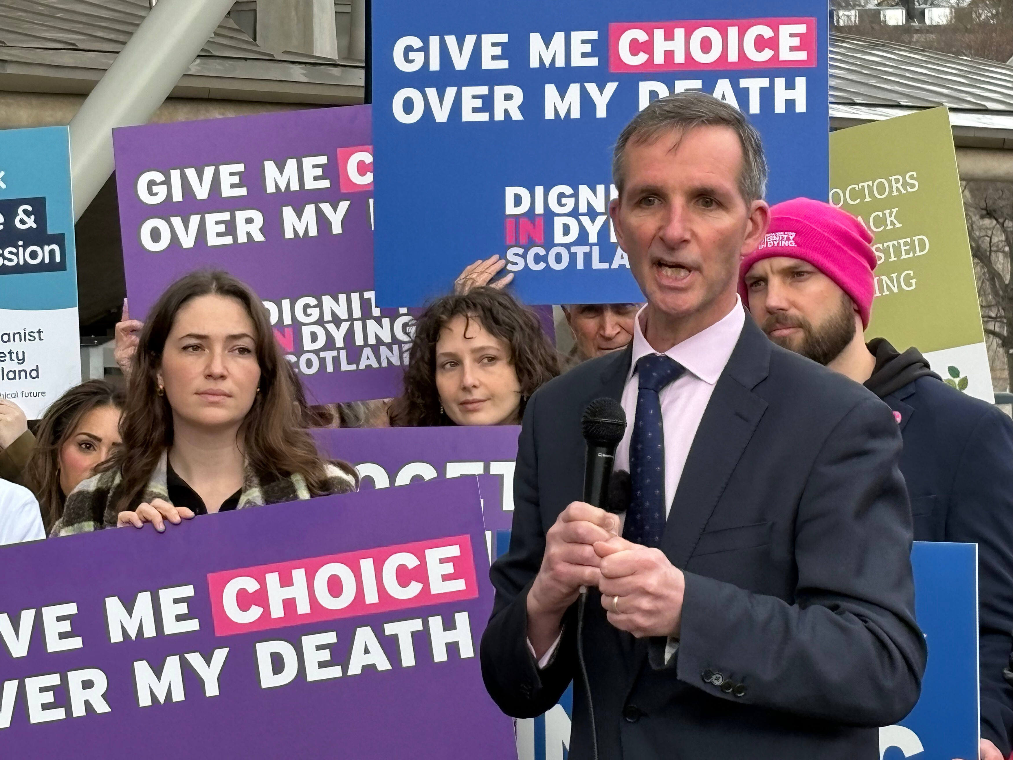 Liberal Democrat lawmaker Liam McArthur joins a rally of supporters ahead of MSPs debating his Assisted Dying for Terminally Ill Adults (Scotland) Bill, in the Scottish Parliament in Edinburgh, Scotland on Tuesday. Photo: PA via AP