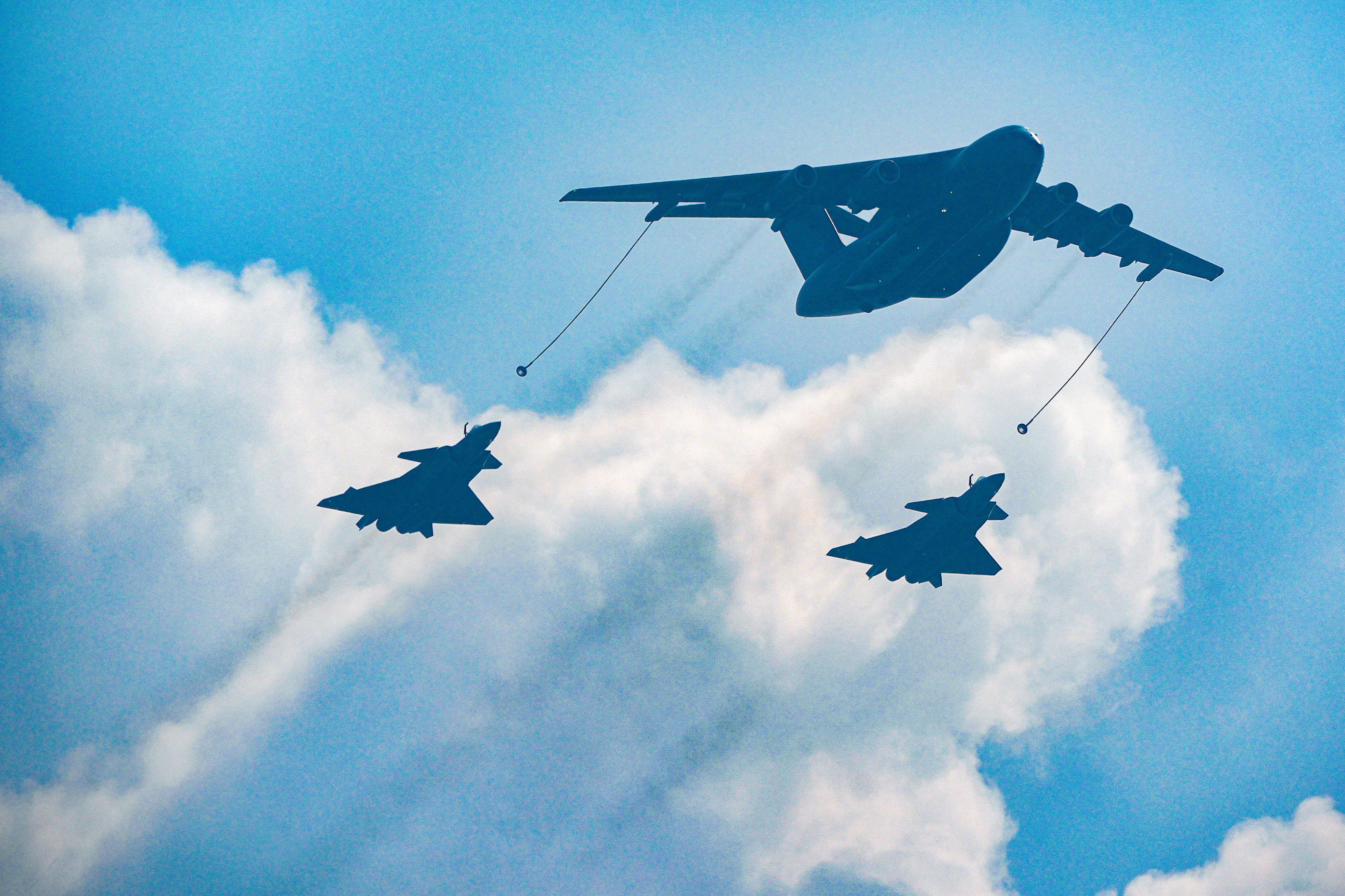 Chinese fighter jets soar over Tiananmen Square in Beijing on September 3, 2025, marking the 80th anniversary of the end of World War II. Photo: Eugene Lee
