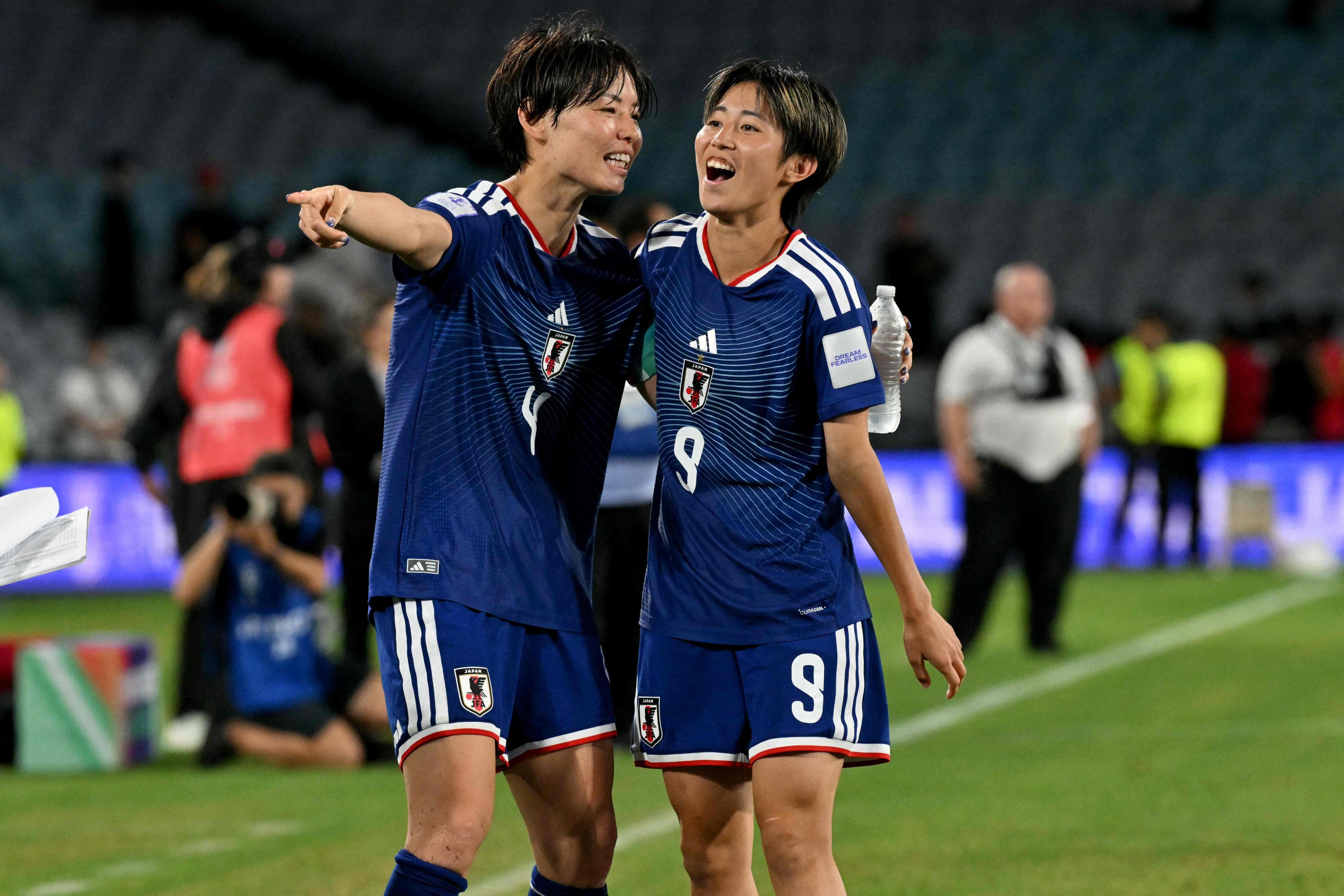 Japan’s Saki Kumagai (left) and Riko Ueki celebrate beating South Korea in their Women’s Asian Cup semi-final in Sydney. Photo: AFP
