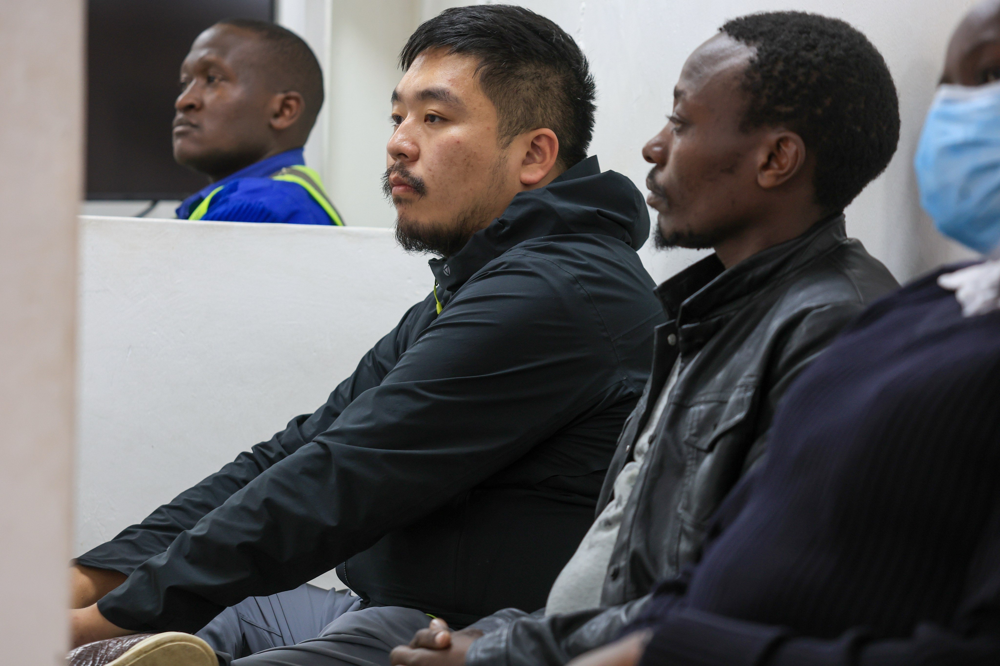 Zhang Kequn, left, and Charles Mwangi at Jomo Kenyatta International Airport Law Courts in Nairobi, Kenya on Tuesday. Photo: AP