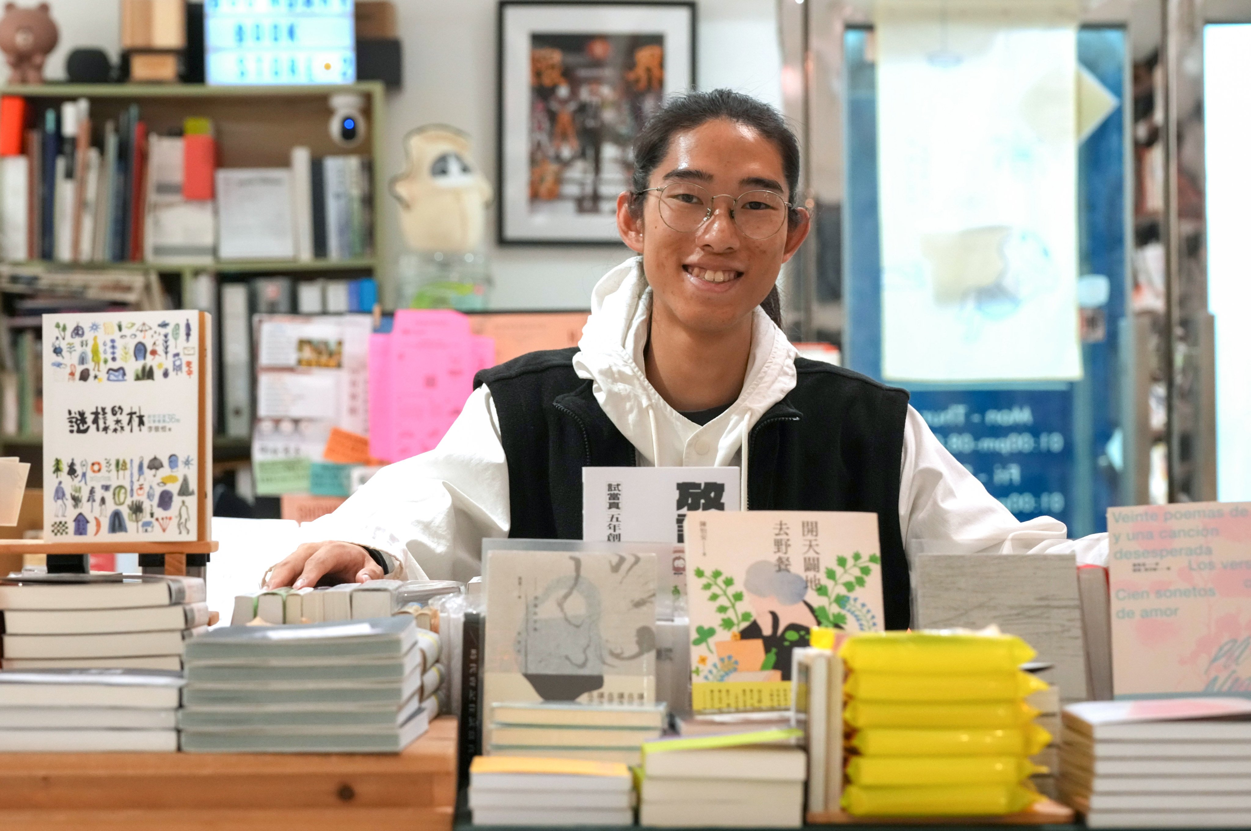 Jerry Pun, the founder of literary organisation Little DooDoo, poses for a photo at Boundary Bookstore in Mong Kok. Photo: Jelly Tse