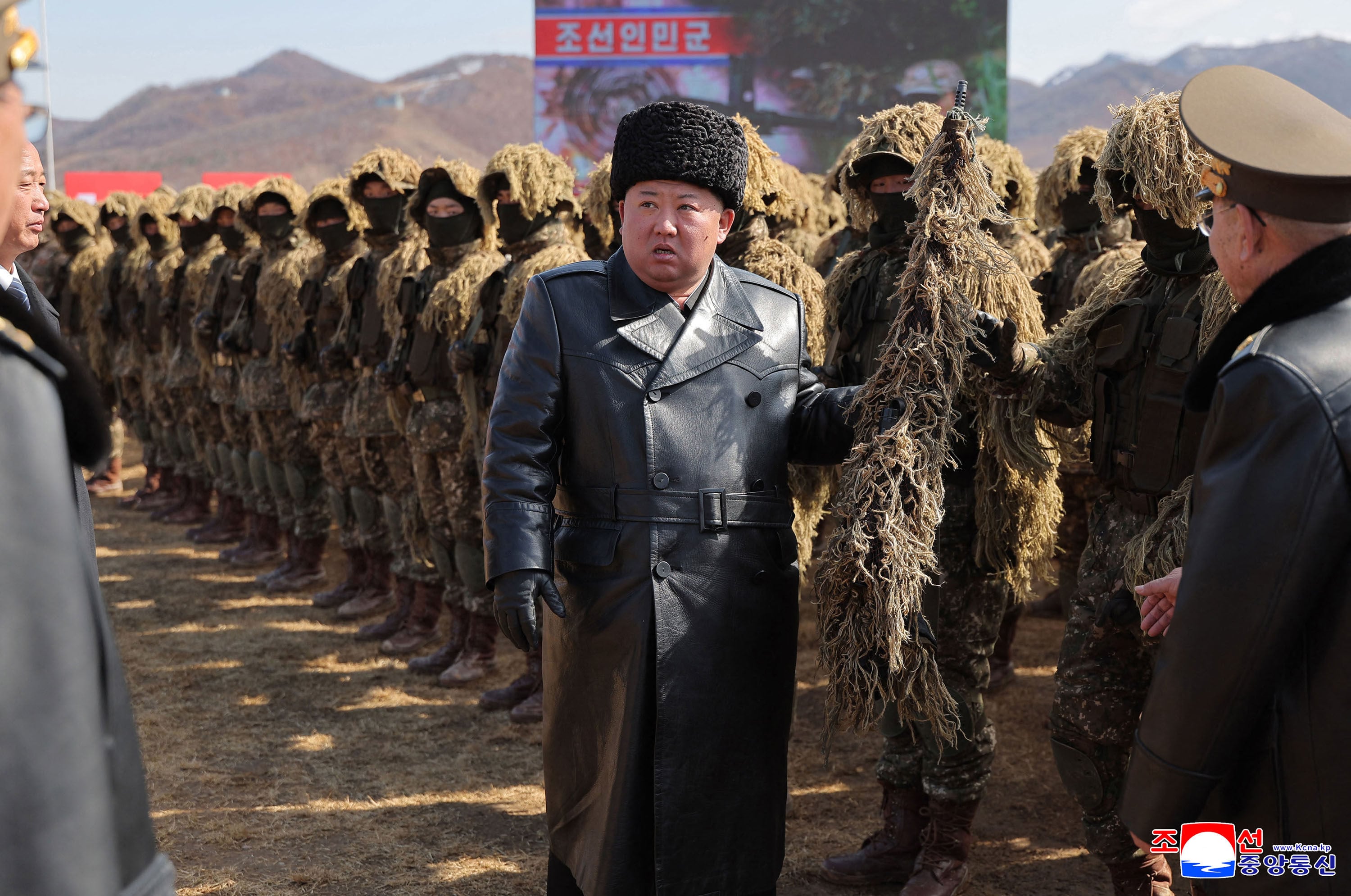 North Korean leader Kim Jong-un inspects a shooting competition to mark the army’s “Snipers’ Day” at a training base on March 3. Photo: KCNA/KNS/AFP/Getty Images/TNS