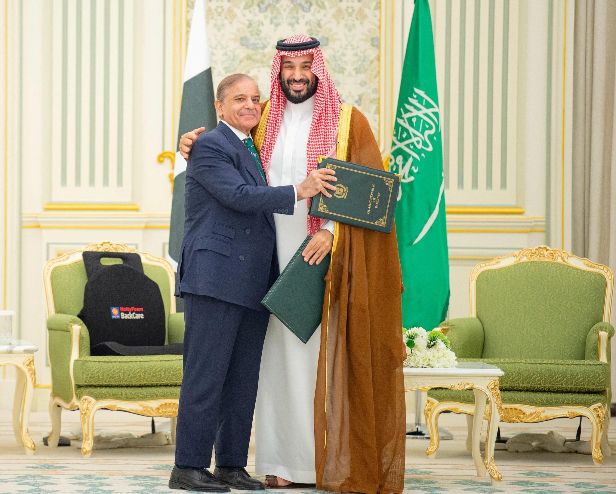 Saudi Crown Prince Mohammed bin Salman and Pakistan Prime Minister Shehbaz Sharif hug after signing a defence pact, in Riyadh, Saudi Arabia, on September 17, 2025. Photo: Reuters