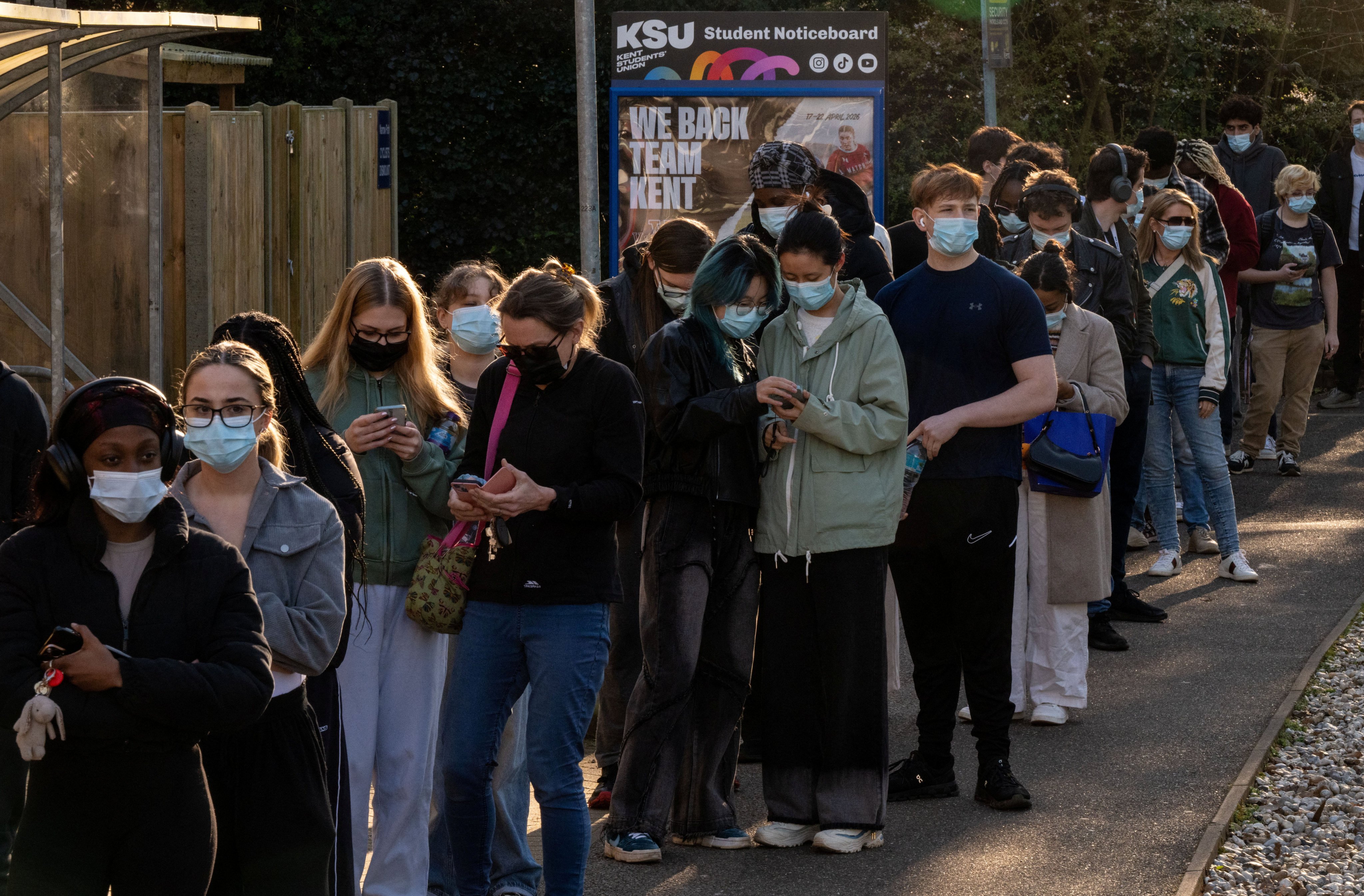 People queue to receive vaccinations at the University of Kent campus. Photo: Reuters
