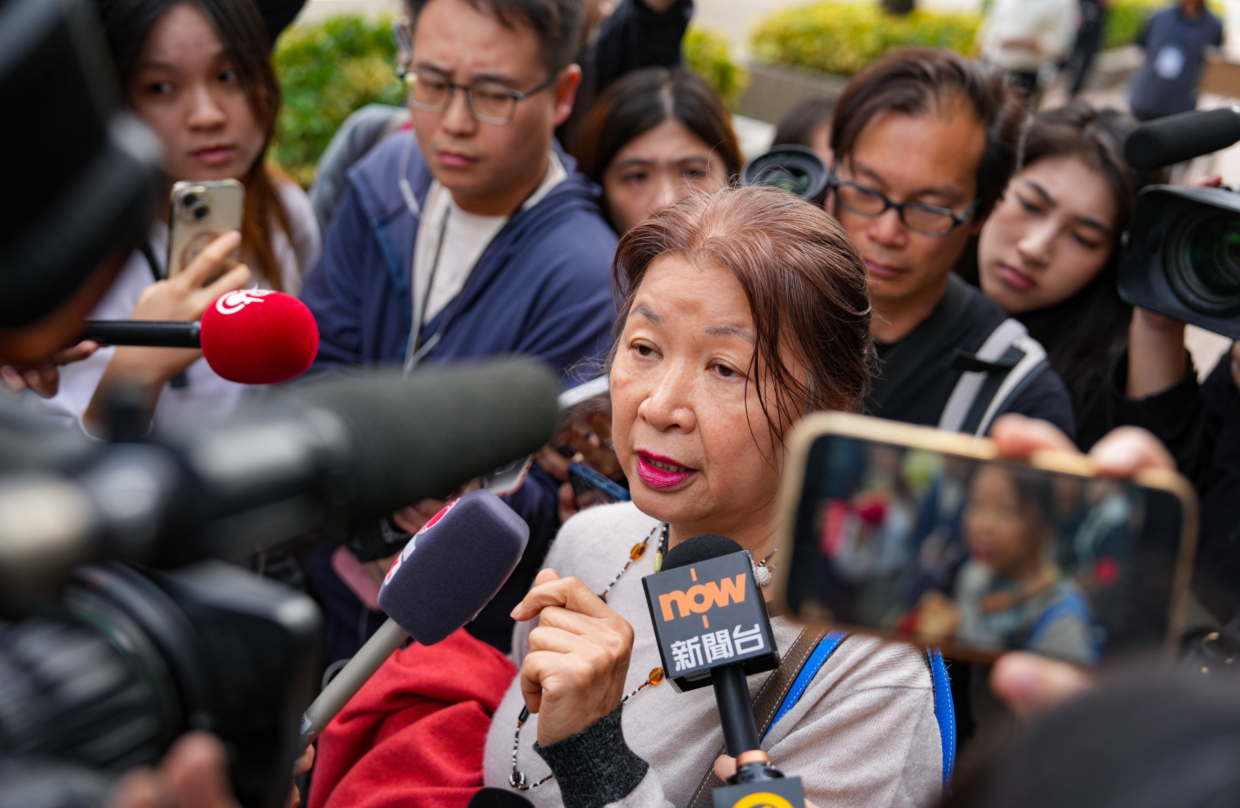 Ms Caroline Chu, Resident of Wang Fuk Court, attends the conference, held by The Independent Committee in relation to the fire at Wang Fuk Court. The Independent Committee in relation to the fire at Wang Fuk Court in Tai Po, holds a direction conference to give directions on the arrangements for subsequent hearings to be conducted by the Committee, located at City Gallery in Central.   05FEB26. SCMP / Sam Tsang
