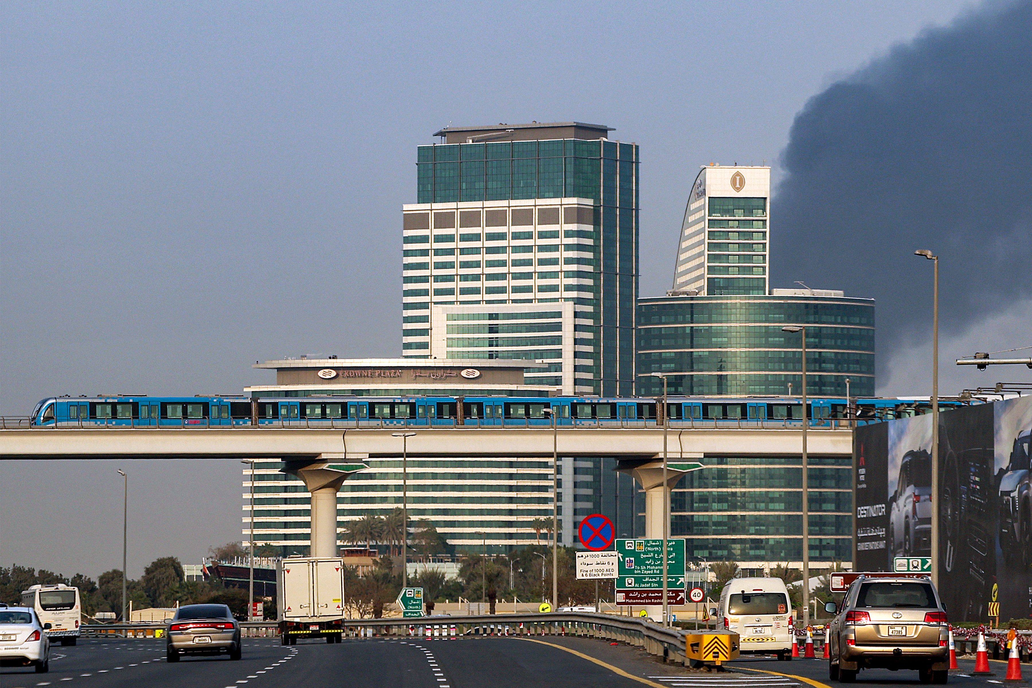 Smoke billows from a fire near Dubai International Airport on March 16, 2026. Photo: AFP