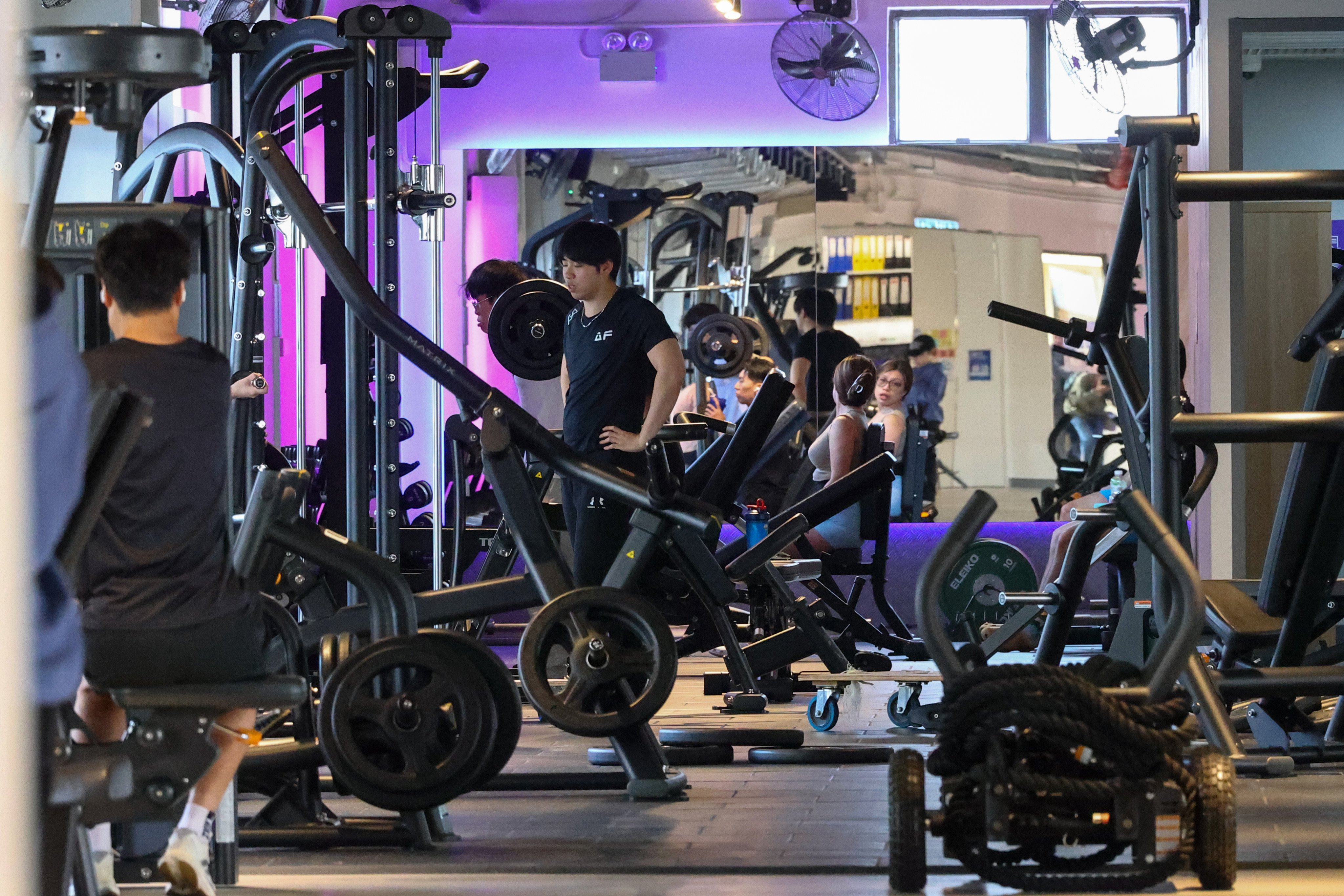 People work out in the Anytime Fitness gym at the Choi Wan Estate in Wong Tai Sin on March 16. Photo: Dickson Lee