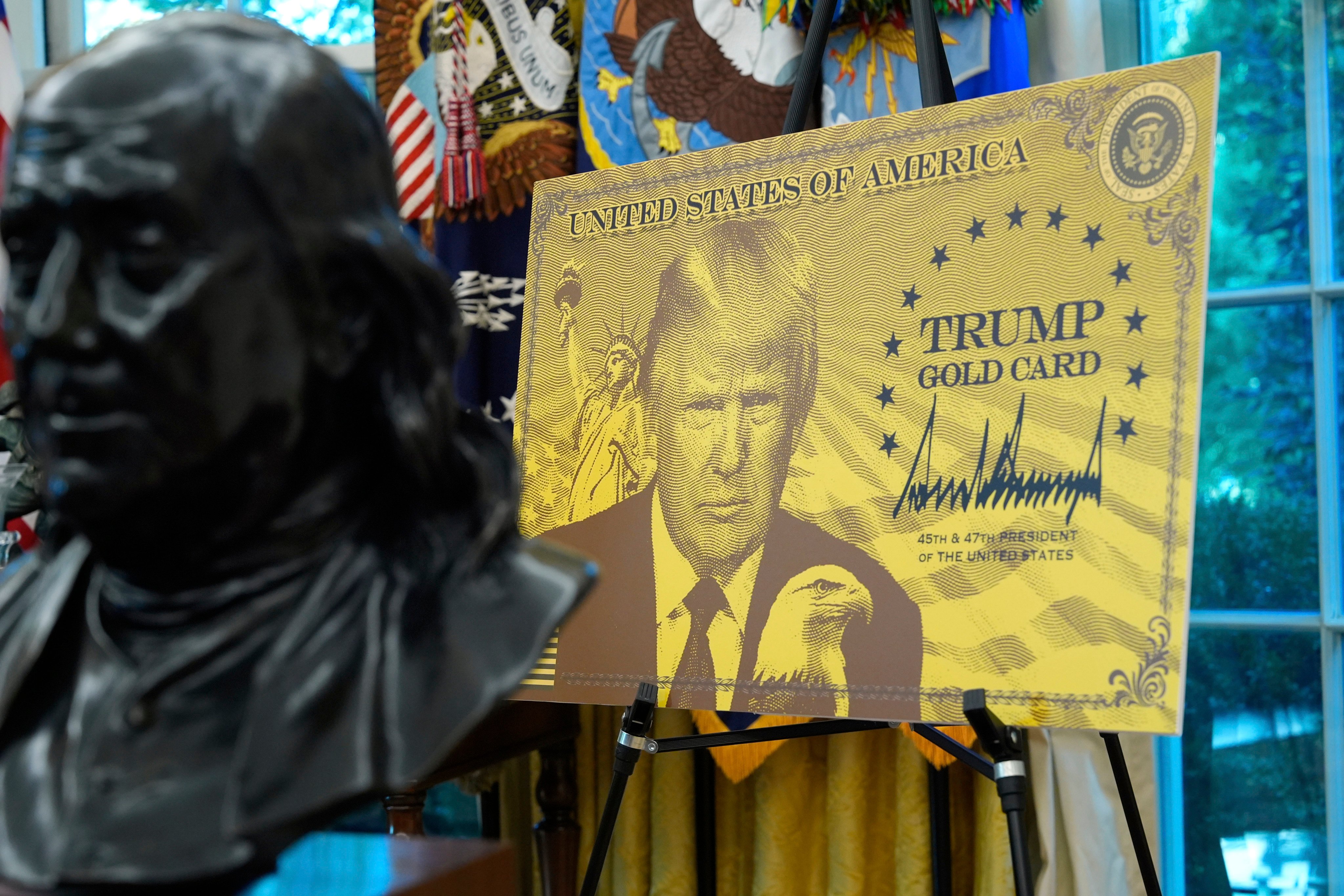 A poster showing the Trump Gold Card is pictured in the White House in September 2025. Photo: AP