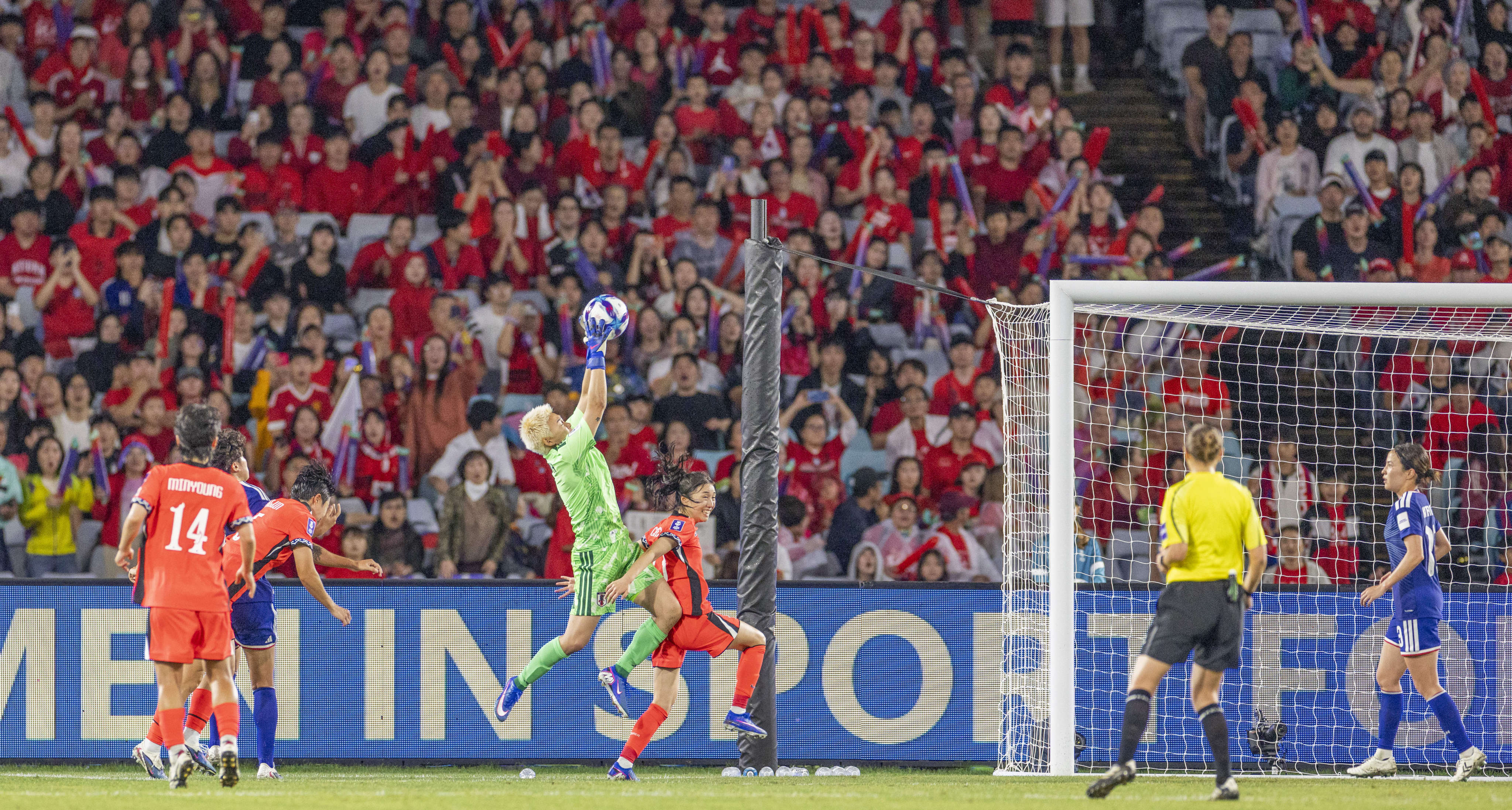 Japan goalkeeper Yamashita Akaya claims the ball against South Korea in the second semi-final of the Women’s Asian Cup, a match played before the largest crowd involving two non-hosting nations. Photo: Xinhua