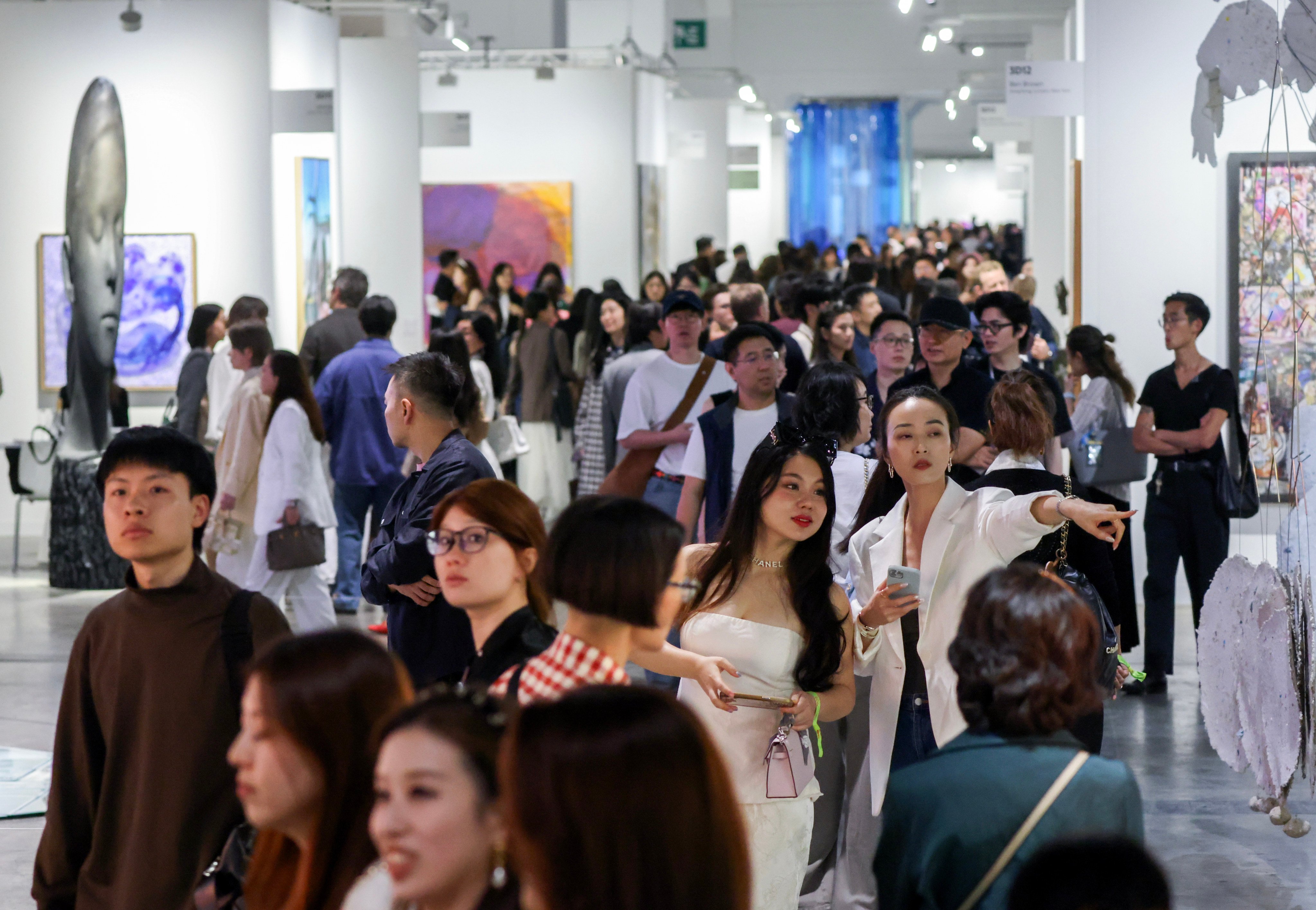 Guests at Art Basel Hong Kong 2025 at the Hong Kong Convention and Exhibition Centre in Wan Chai. Photo: Eugene Lee