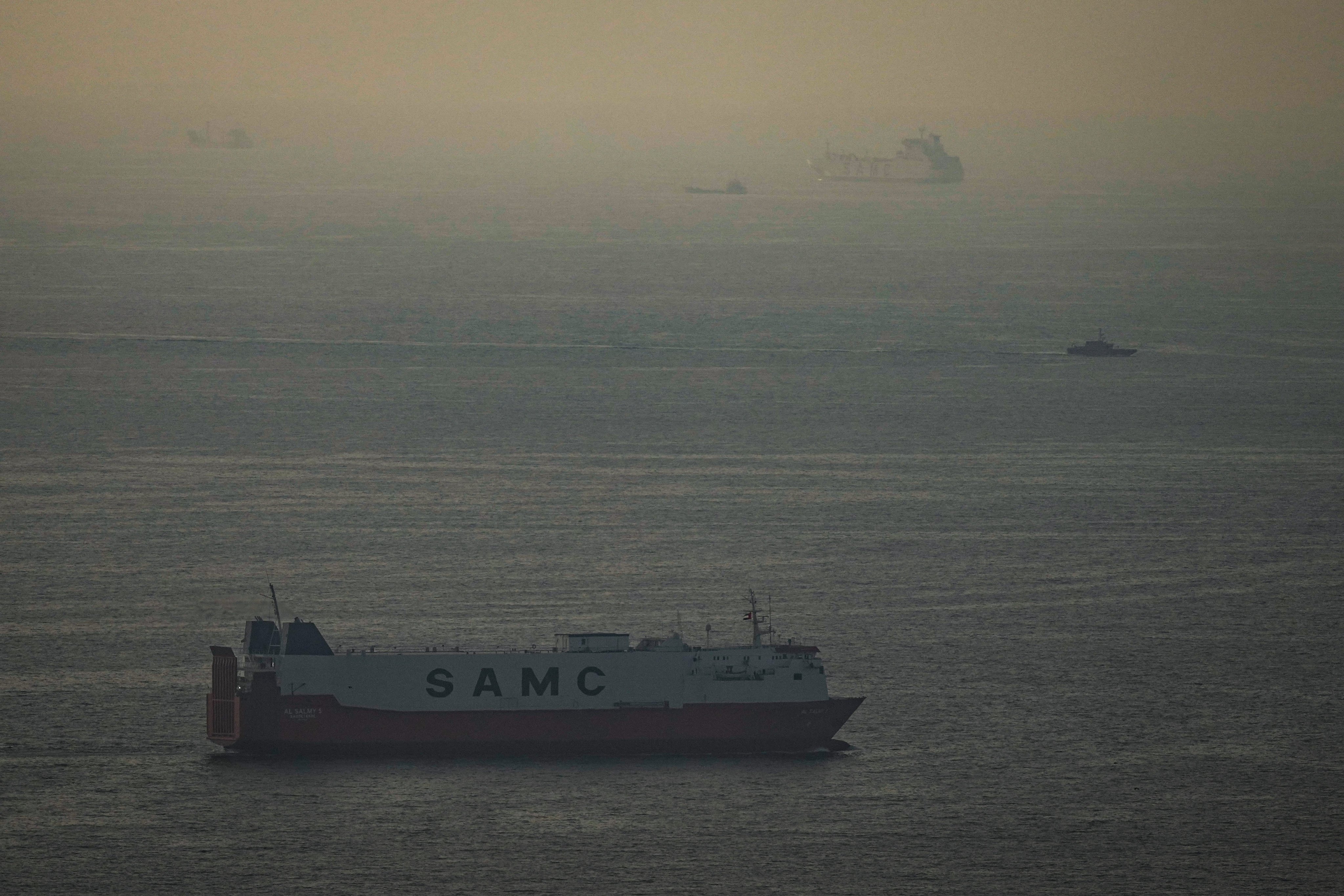 Cargo ships sail in the Arabian Gulf towards the Strait of Hormuz on Thursday. Photo: AP