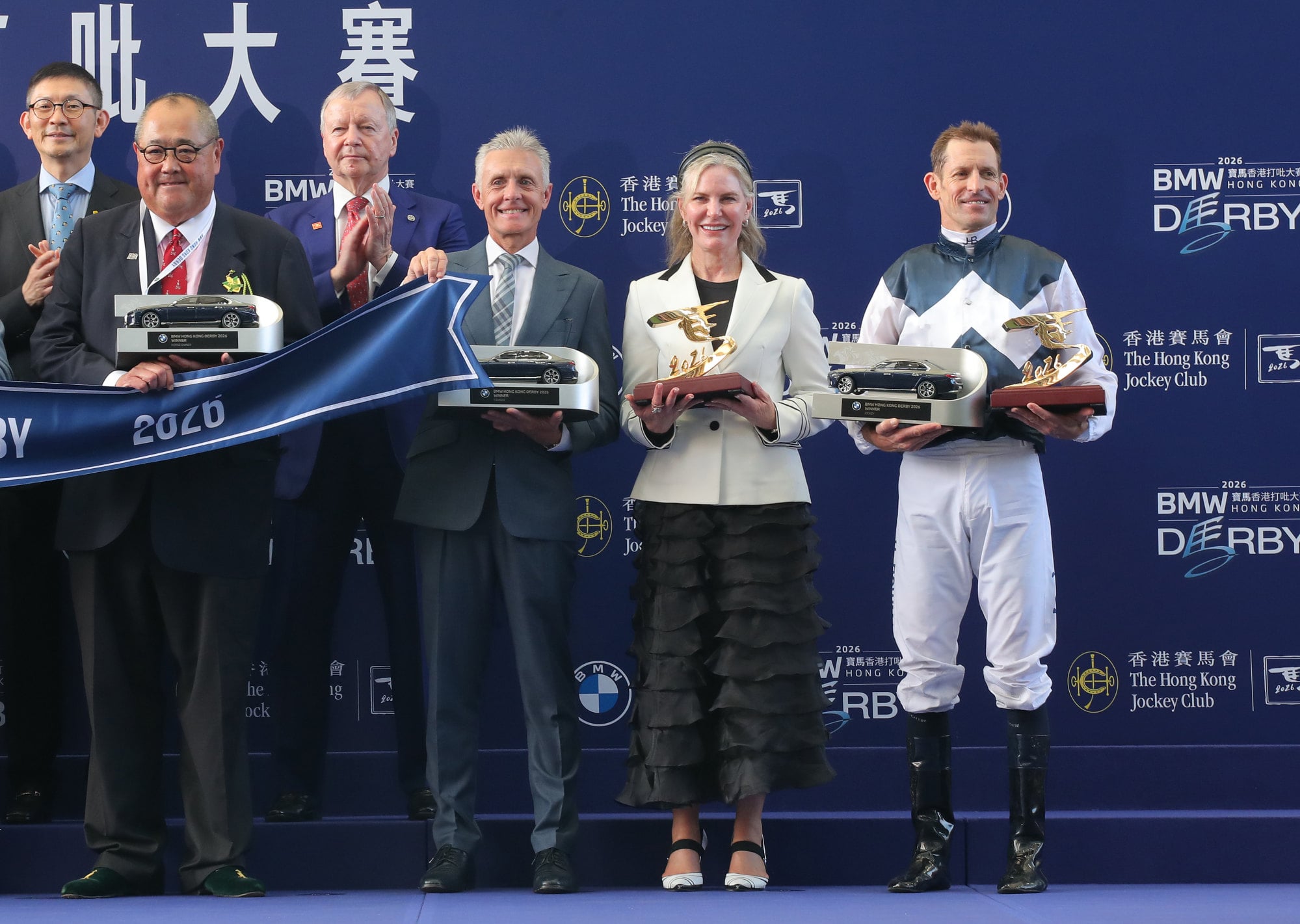 Trainer Mark Newnham, jockey Hugh Bowman and connections celebrate Invincible Ibis’ Derby success.